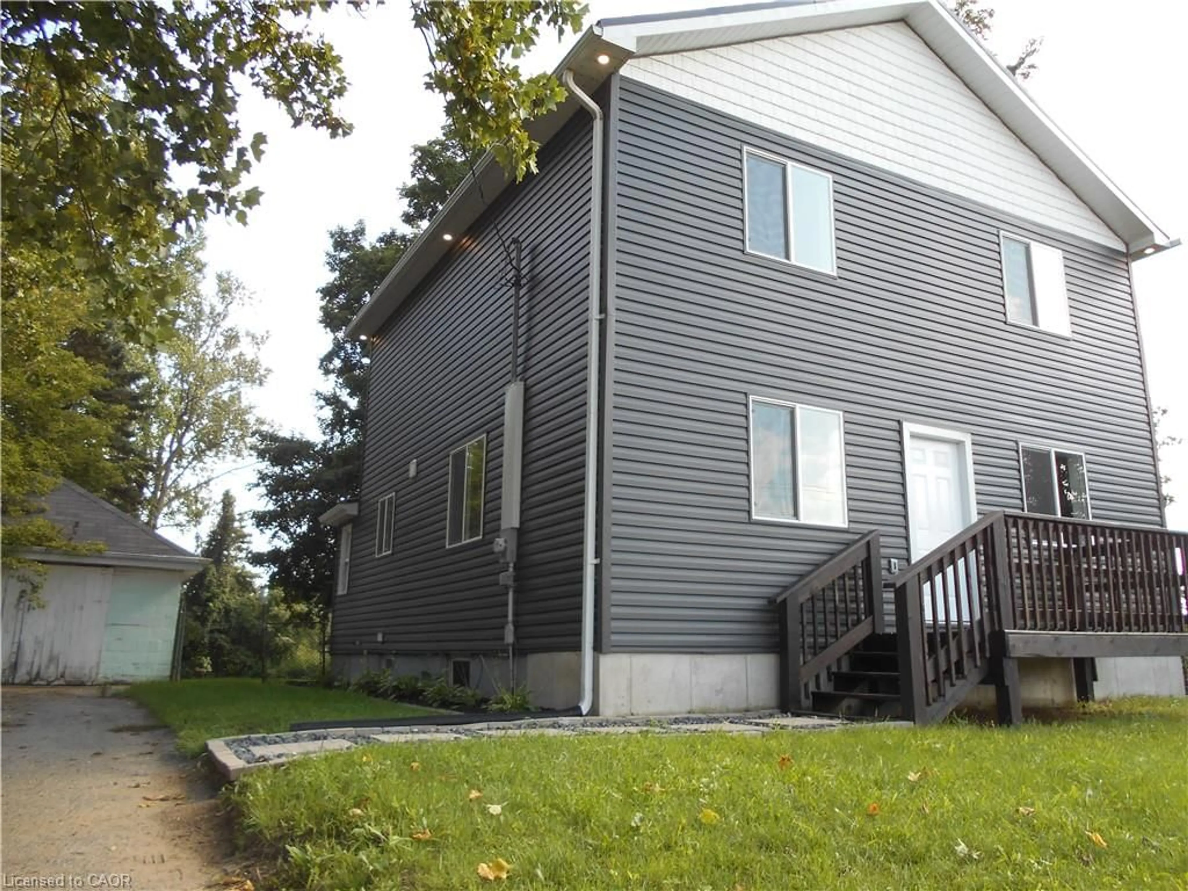 Home with vinyl exterior material, street for 98 Charlotteville Rd 1, St. Williams Ontario N0E 1P0