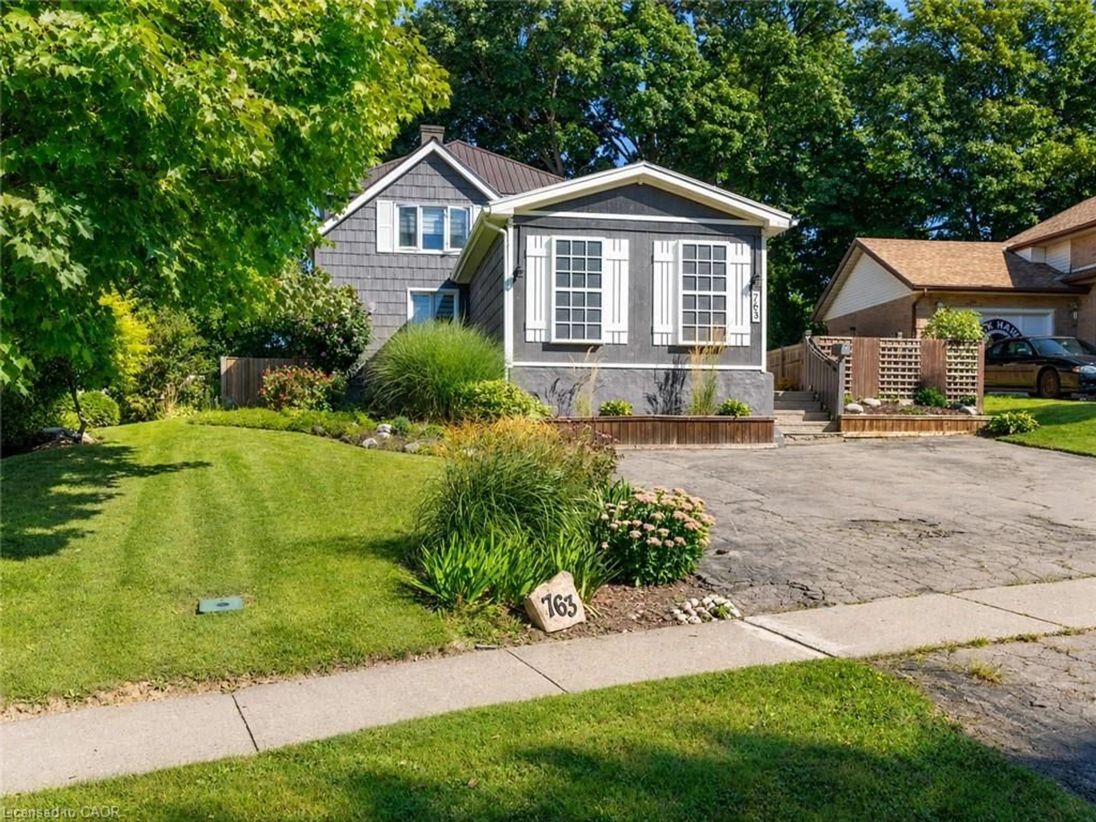 Home with vinyl exterior material, street for 763 Boyle Dr, Woodstock Ontario N4S 8M1