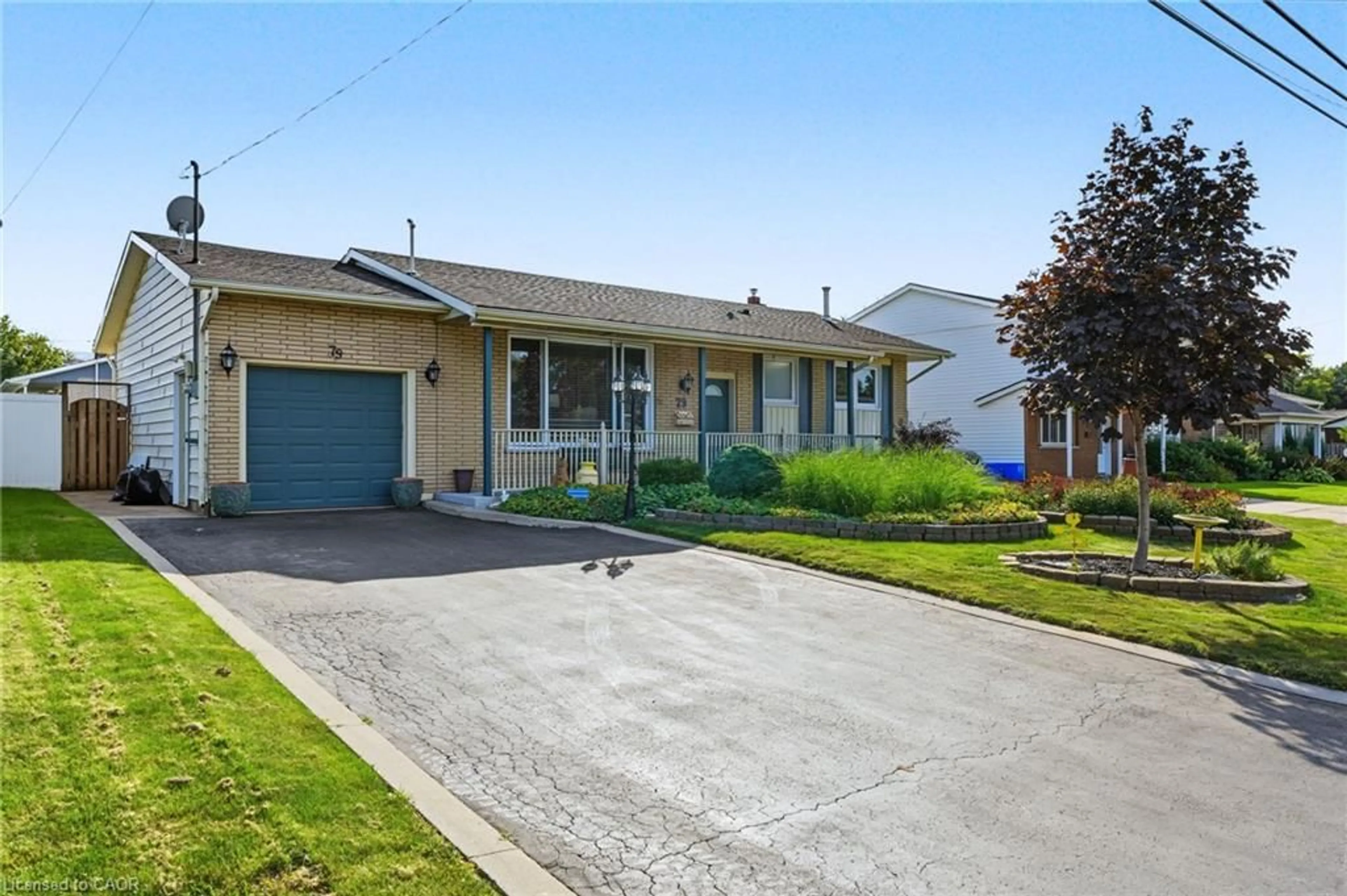 Home with vinyl exterior material, street for 79 Olive St, Grimsby Ontario L3M 2C6