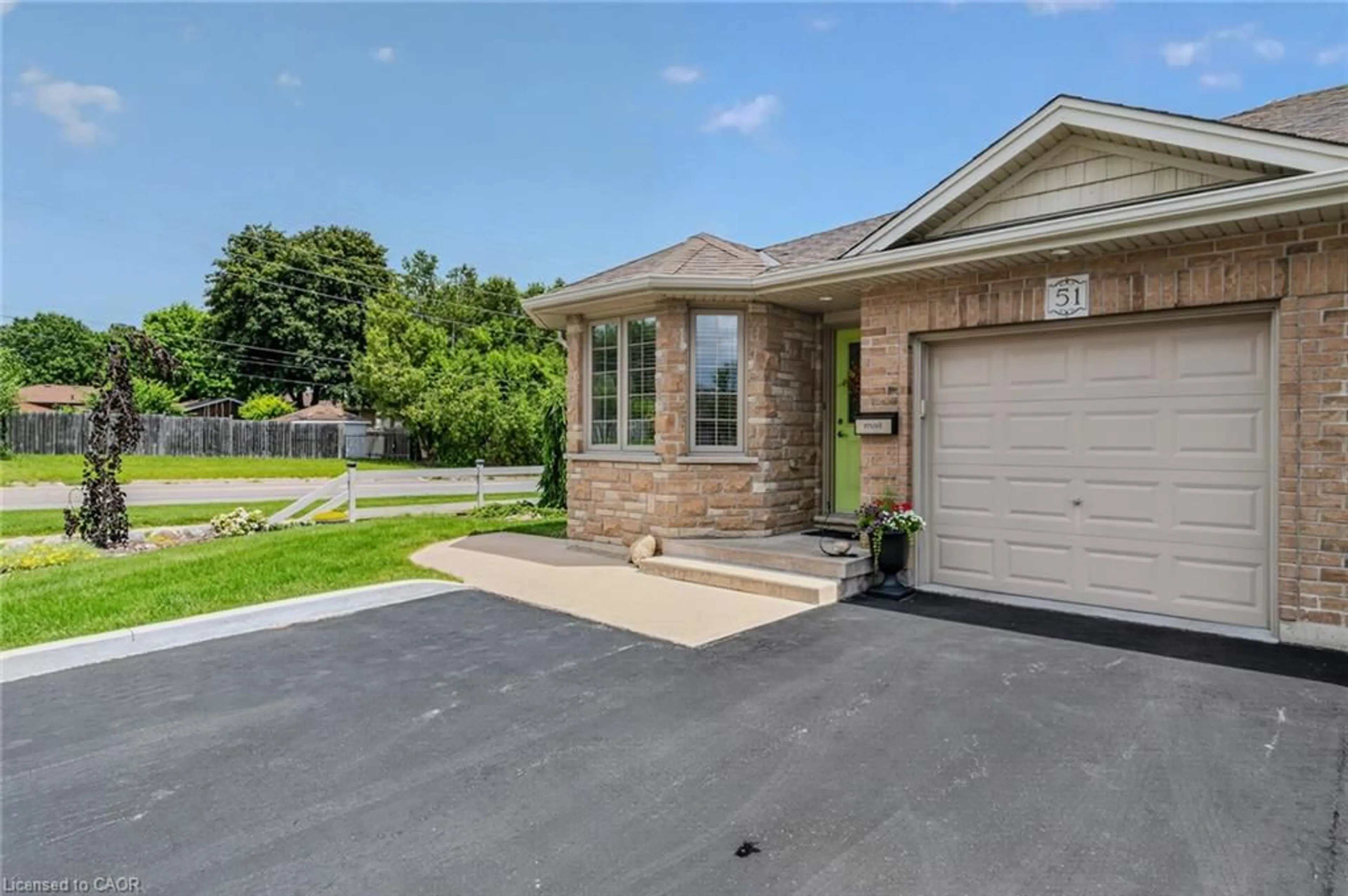 Home with brick exterior material, street for 51 Millcroft Dr, Simcoe Ontario N3Y 0B1