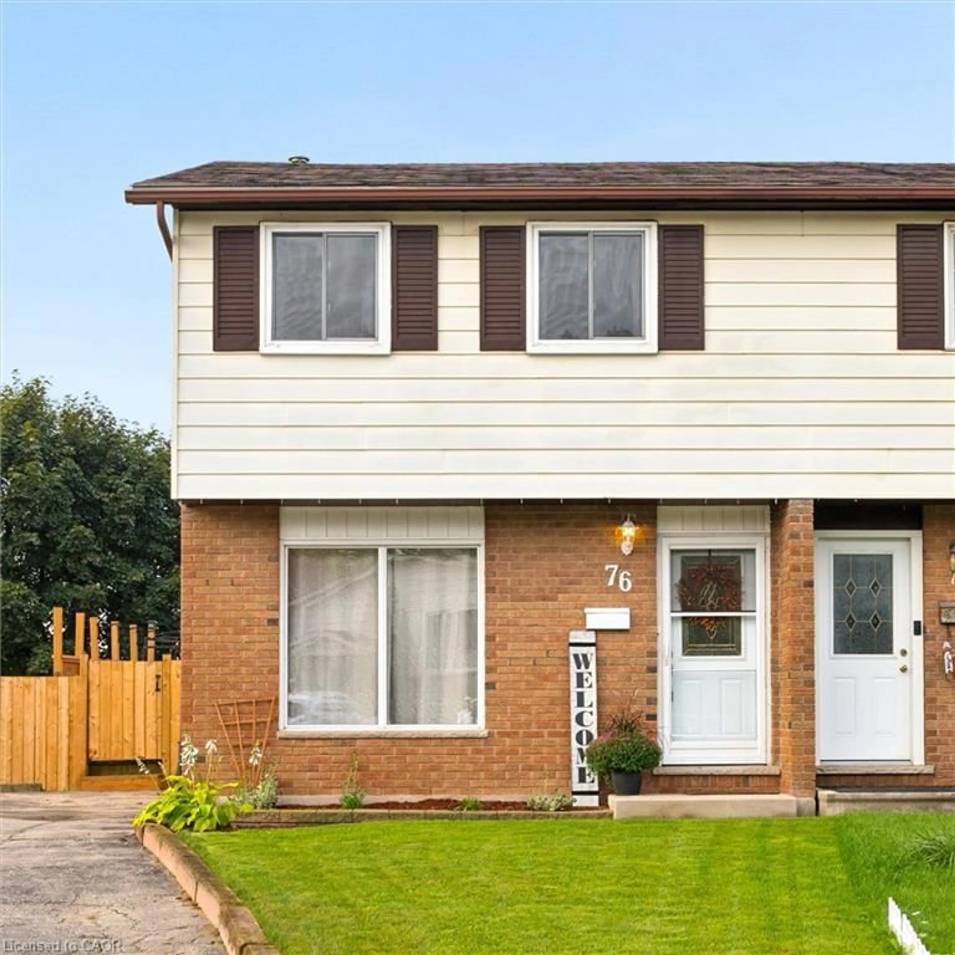 Home with brick exterior material, street for 76 Cluthe Cres, Kitchener Ontario N2P 1M8
