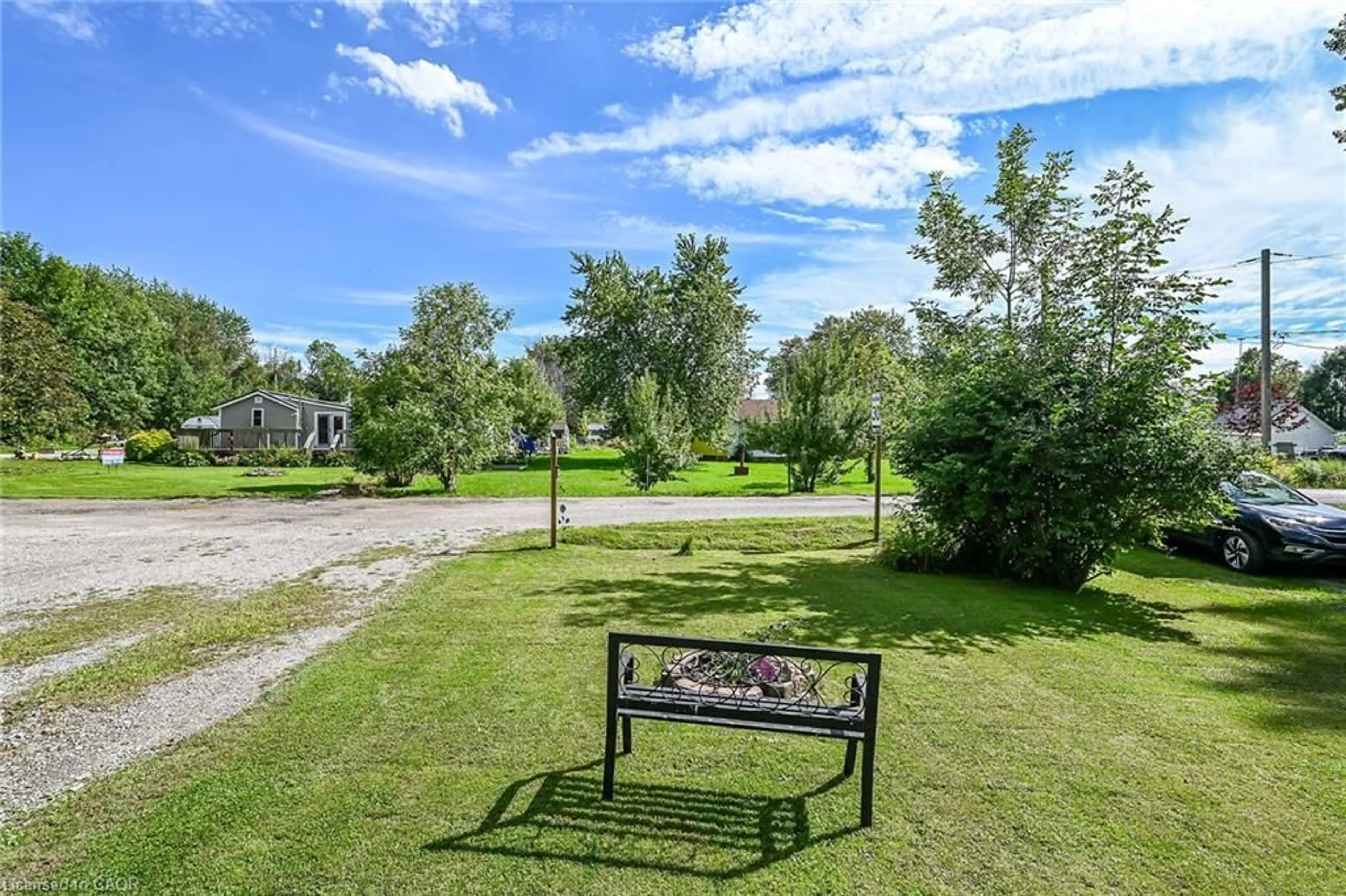 A pic from outside/outdoor area/front of a property/back of a property/a pic from drone, water/lake/river/ocean view for 17 Semmens St, Peacock Point Ontario N0A 1L0