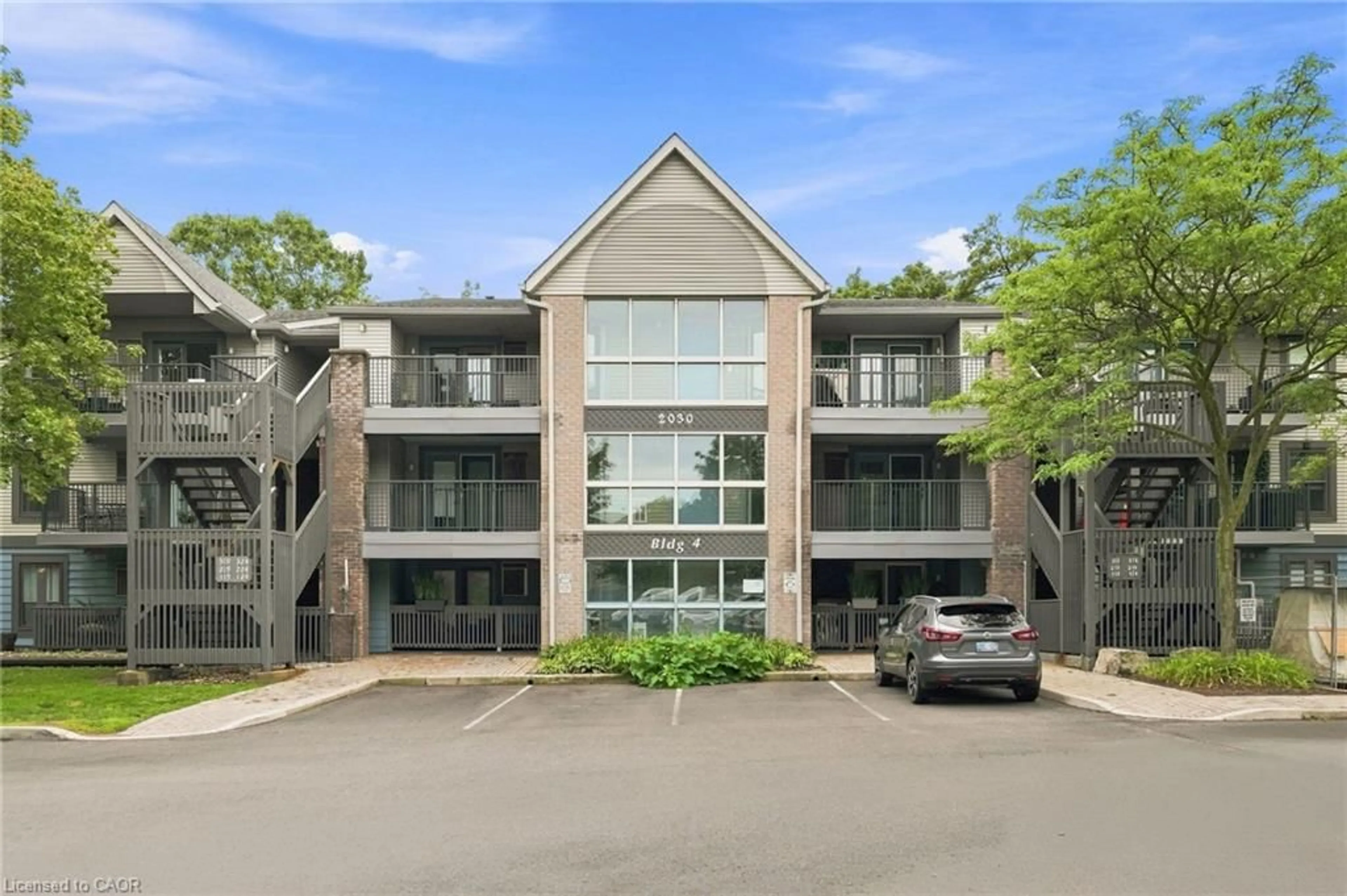 A pic from outside/outdoor area/front of a property/back of a property/a pic from drone, building for 2030 Cleaver Ave #322, Burlington Ontario L7M 4C3