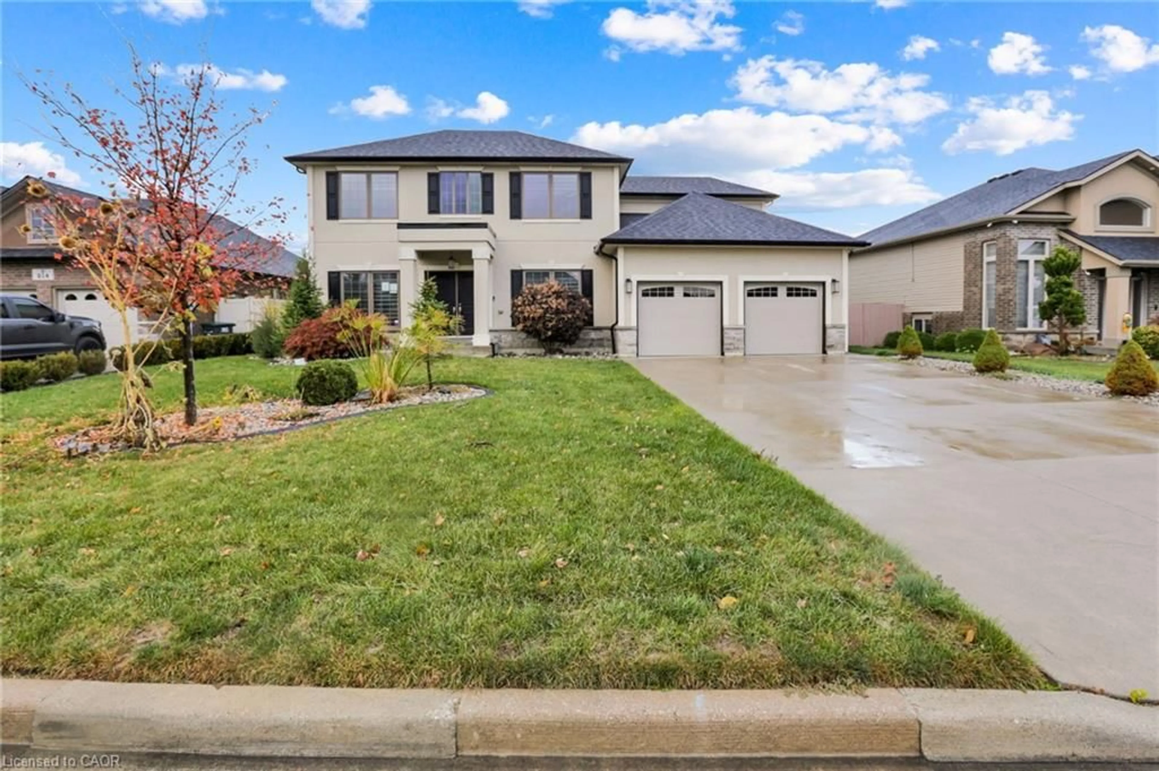 Home with vinyl exterior material, street for 212 Jasmine Dr, Lakeshore Ontario N8L 0T1