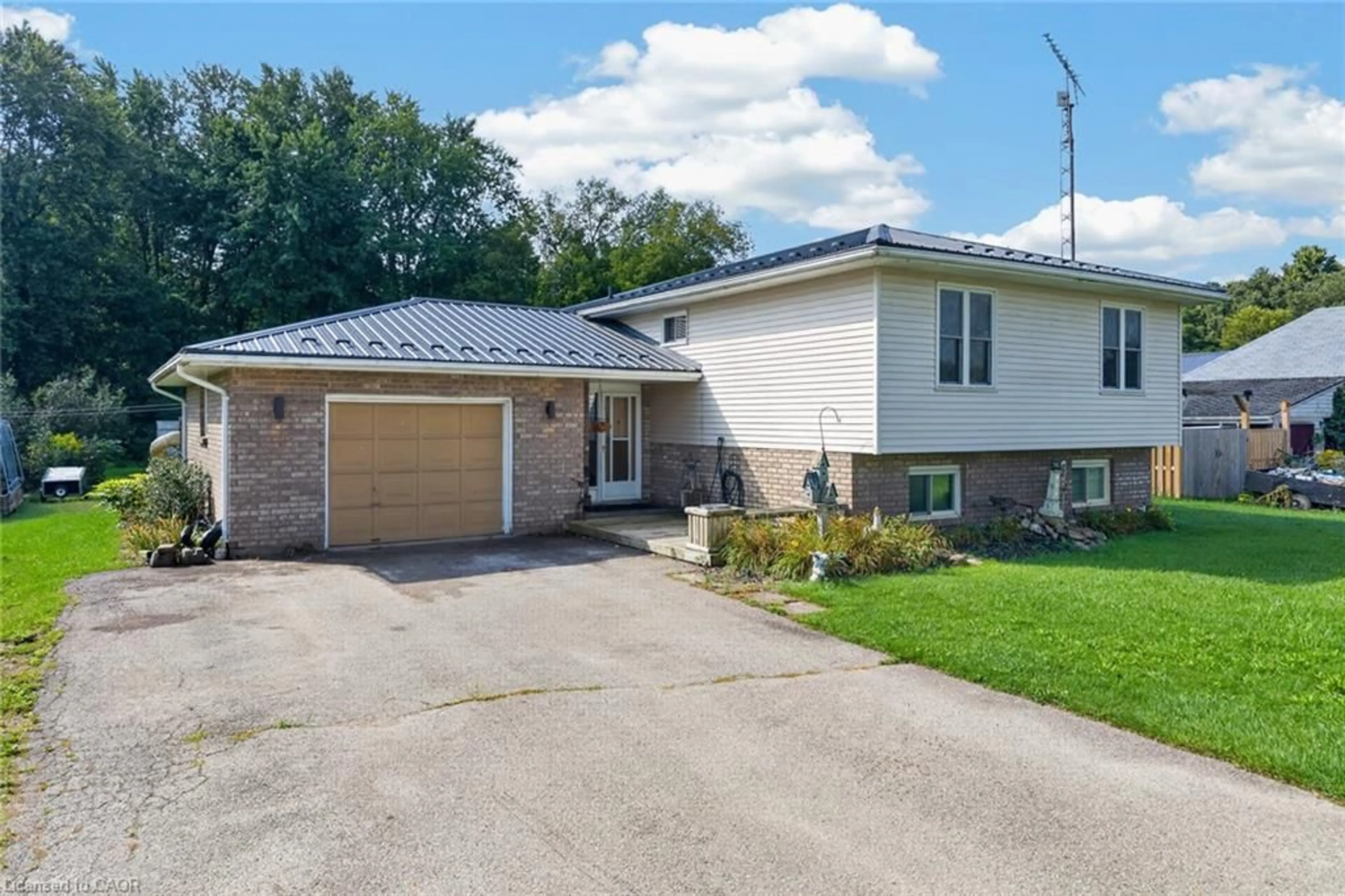 Home with brick exterior material, street for 914 Windham Road 11 Rd, Delhi Ontario N4B 2W5