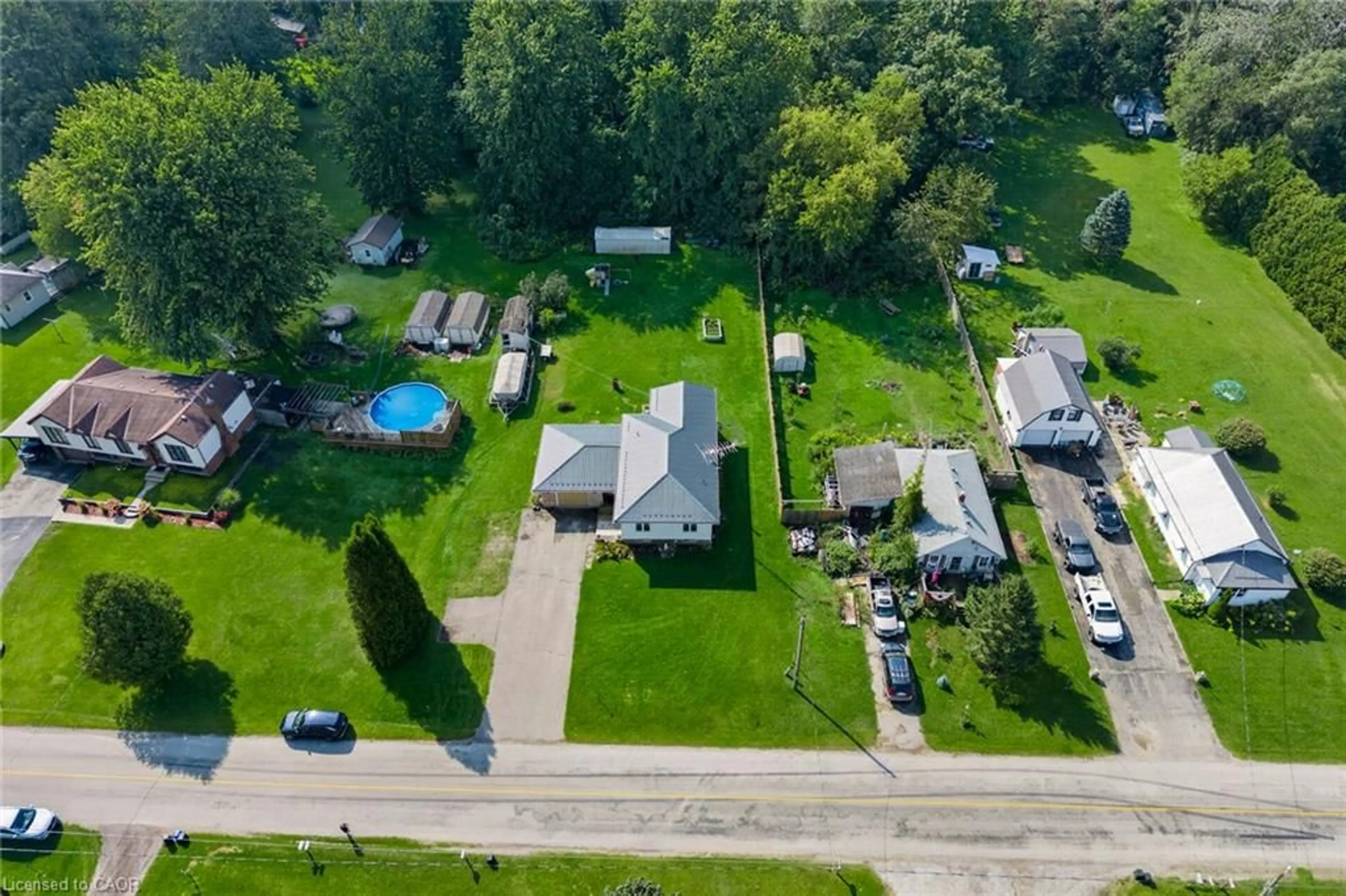 A pic from outside/outdoor area/front of a property/back of a property/a pic from drone, street for 914 Windham Road 11 Rd, Delhi Ontario N4B 2W5