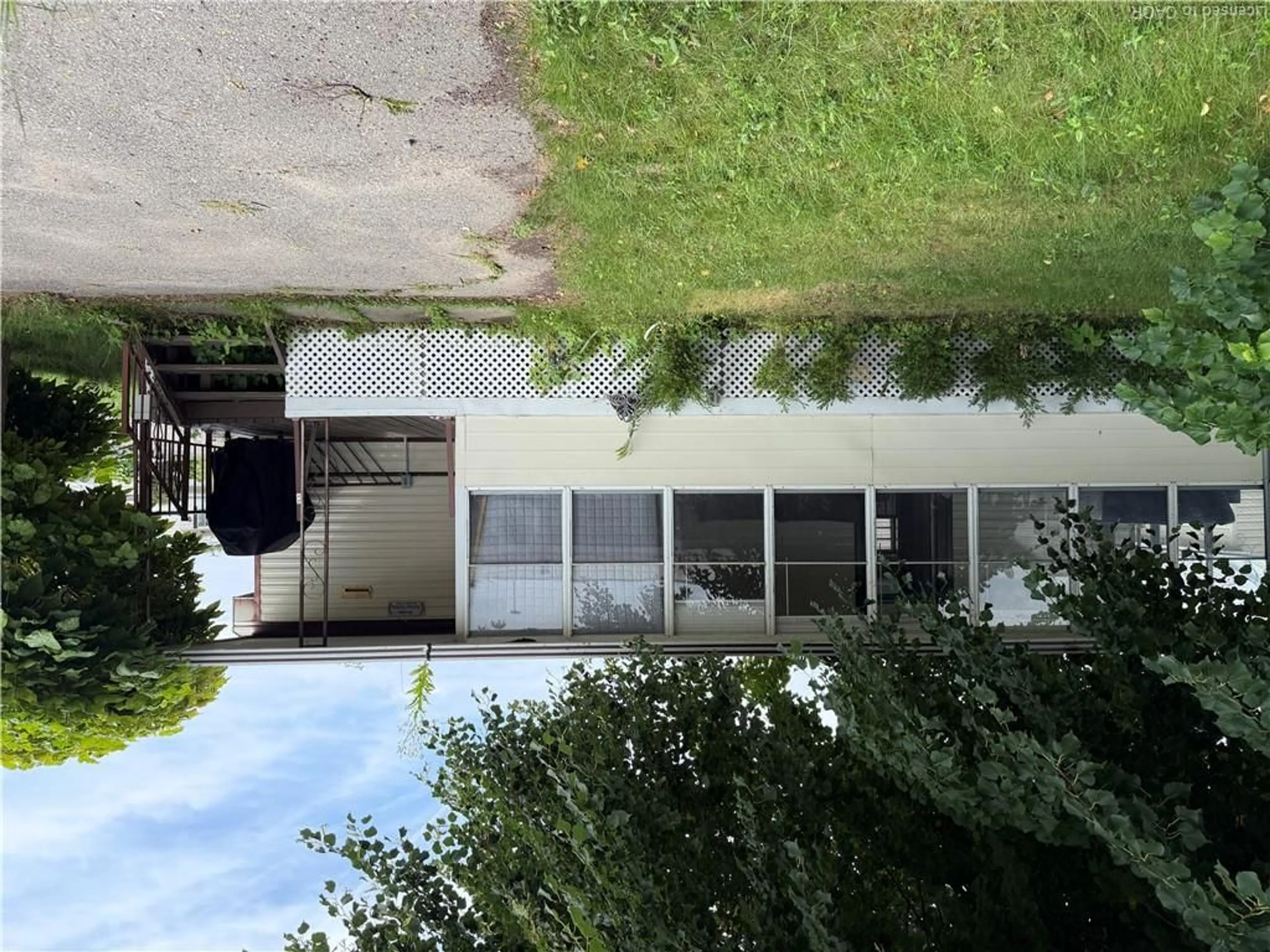 A pic from outside/outdoor area/front of a property/back of a property/a pic from drone, building for 92 Clubhouse Rd #35, Turkey Point Ontario N0E 1T0