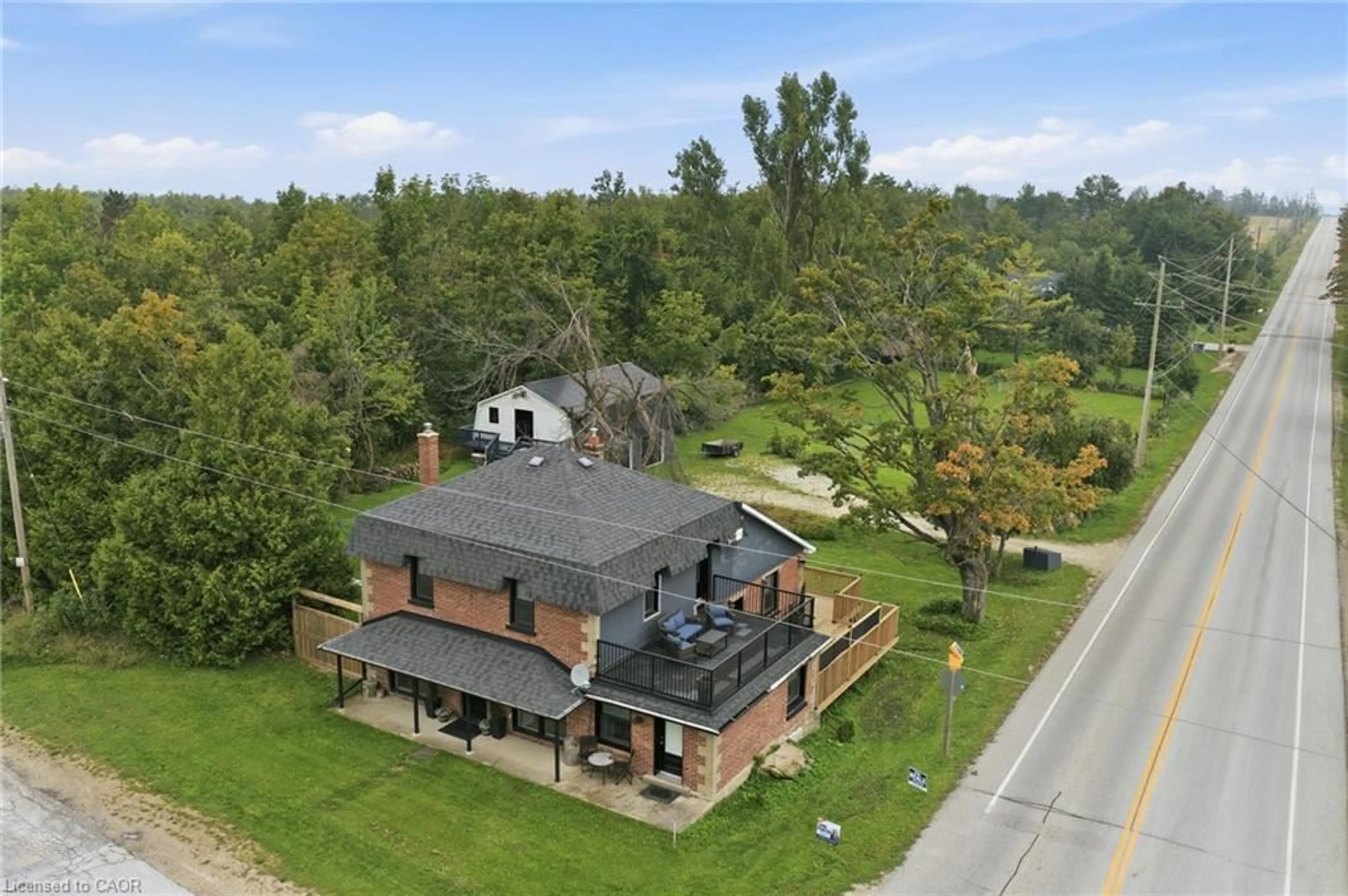 A pic from outside/outdoor area/front of a property/back of a property/a pic from drone, unknown for 629295 Grey Road 119, The Blue Mountains Ontario N0H 1J0