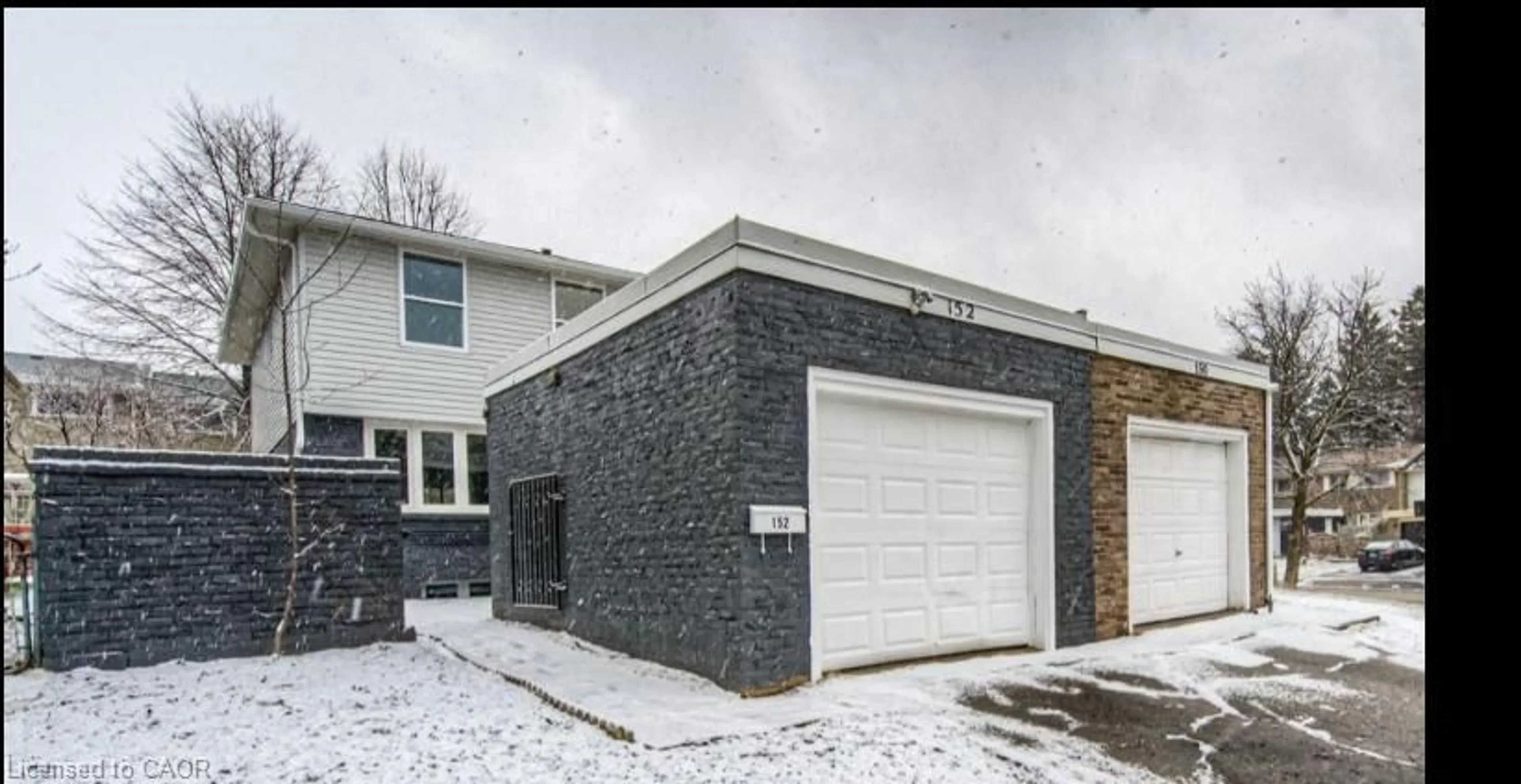 Home with brick exterior material, street for 152 Overlea Dr, Kitchener Ontario N2M 1T3