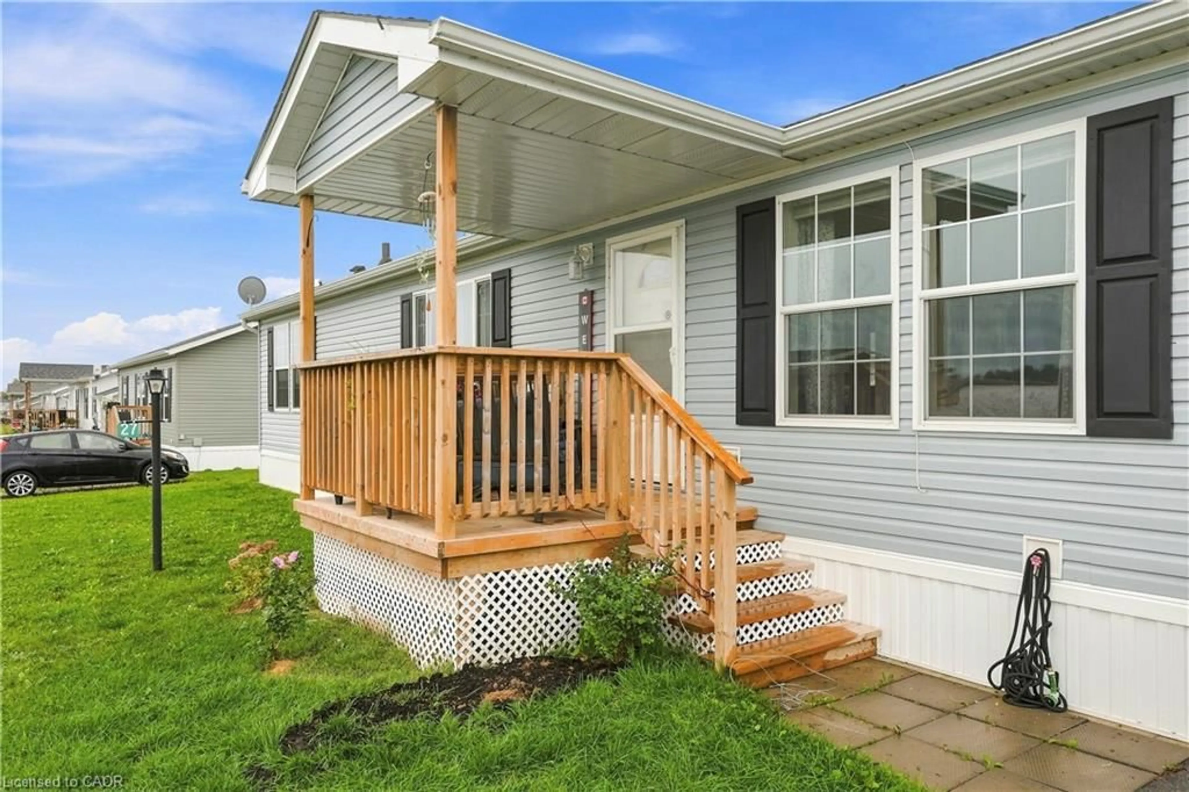 Home with vinyl exterior material, street for 27 Hickory Hollow, Nanticoke Ontario N0A 1P0