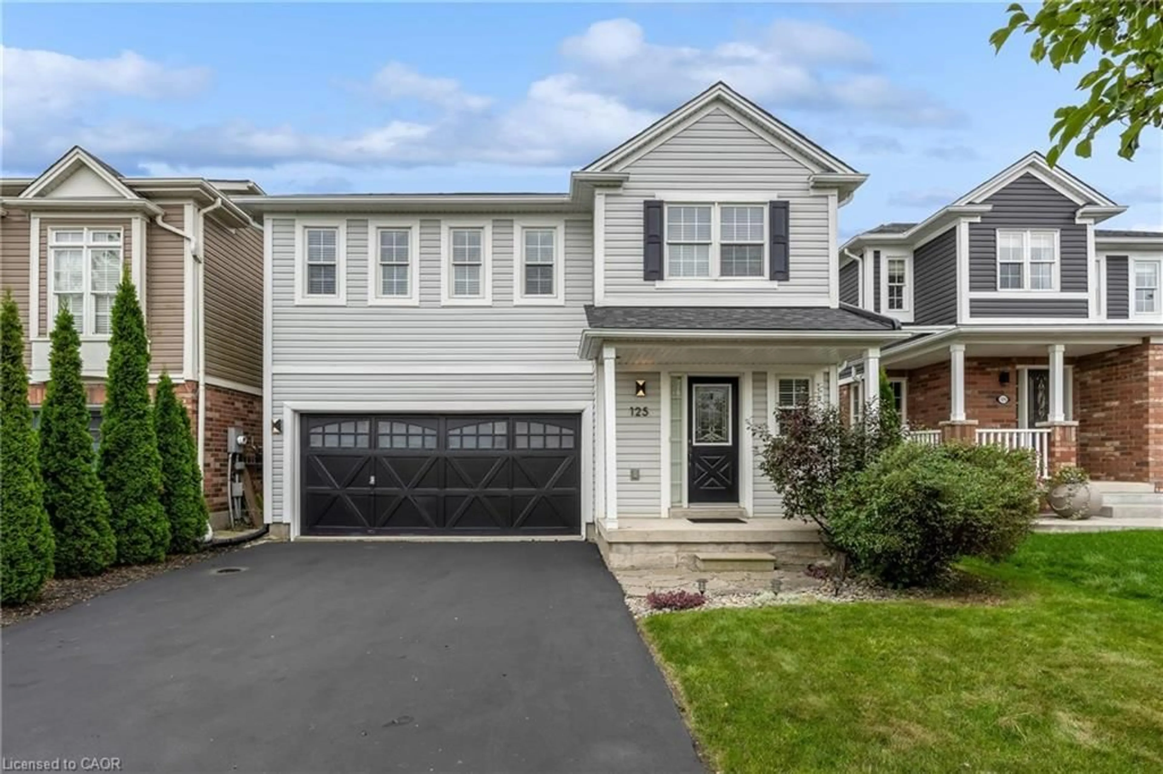 Home with vinyl exterior material, street for 125 Voyager Pass, Binbrook Ontario L0R 1C0