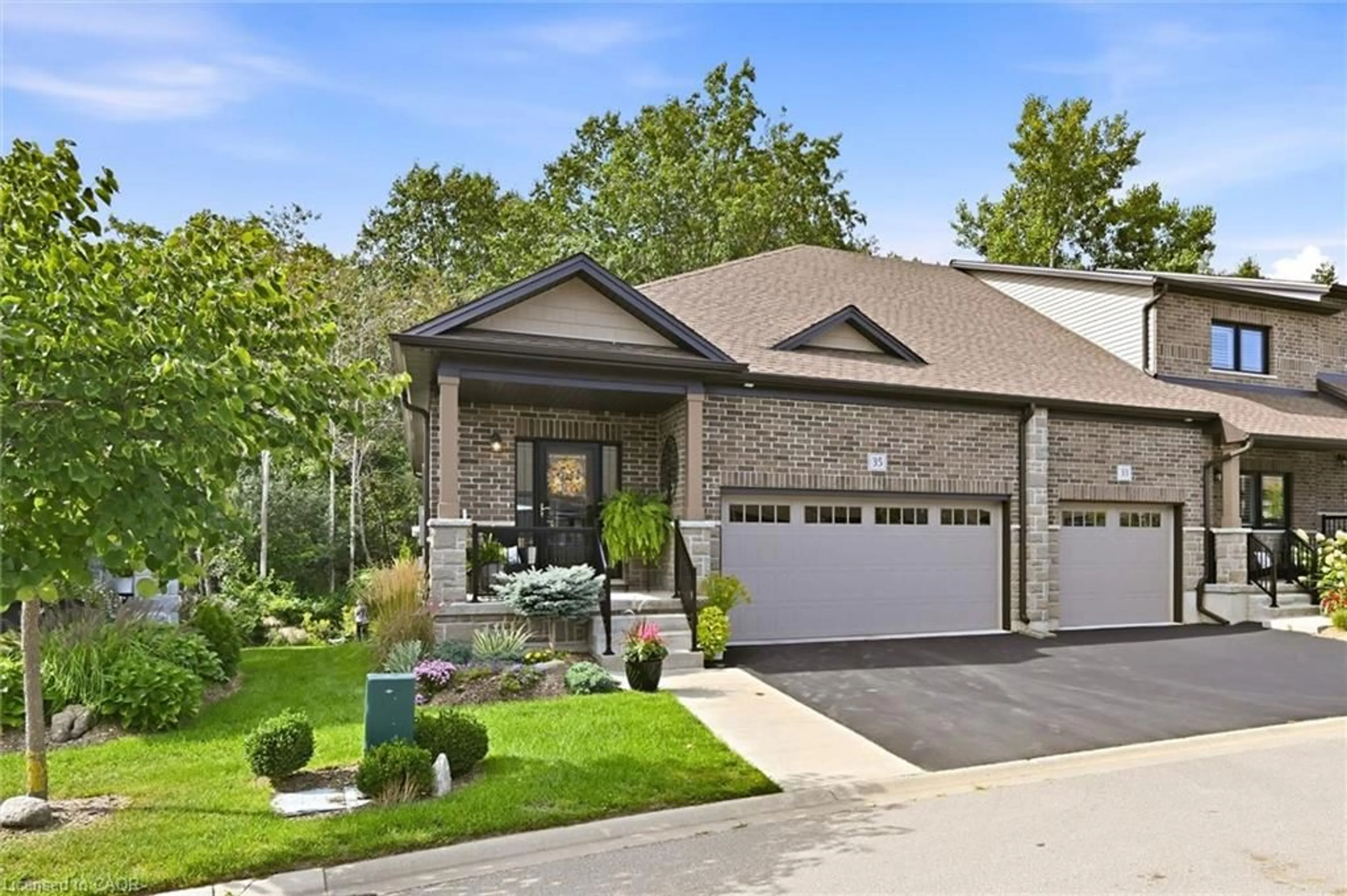 Home with brick exterior material, street for 35 Tamarack Way, Simcoe Ontario N3Y 0E7