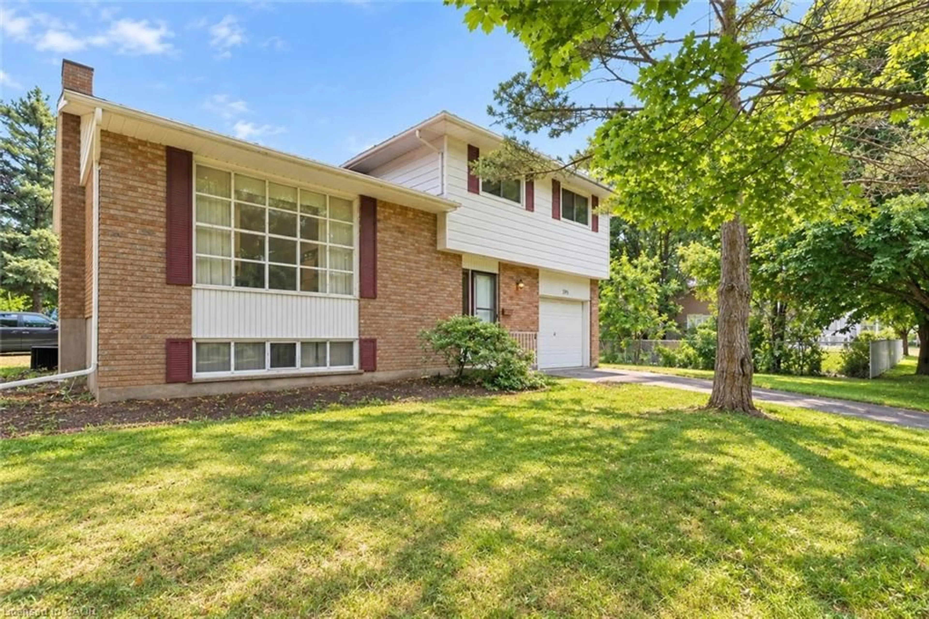 Home with brick exterior material, street for 395 Mossom Pl, Waterloo Ontario N2K 2G7