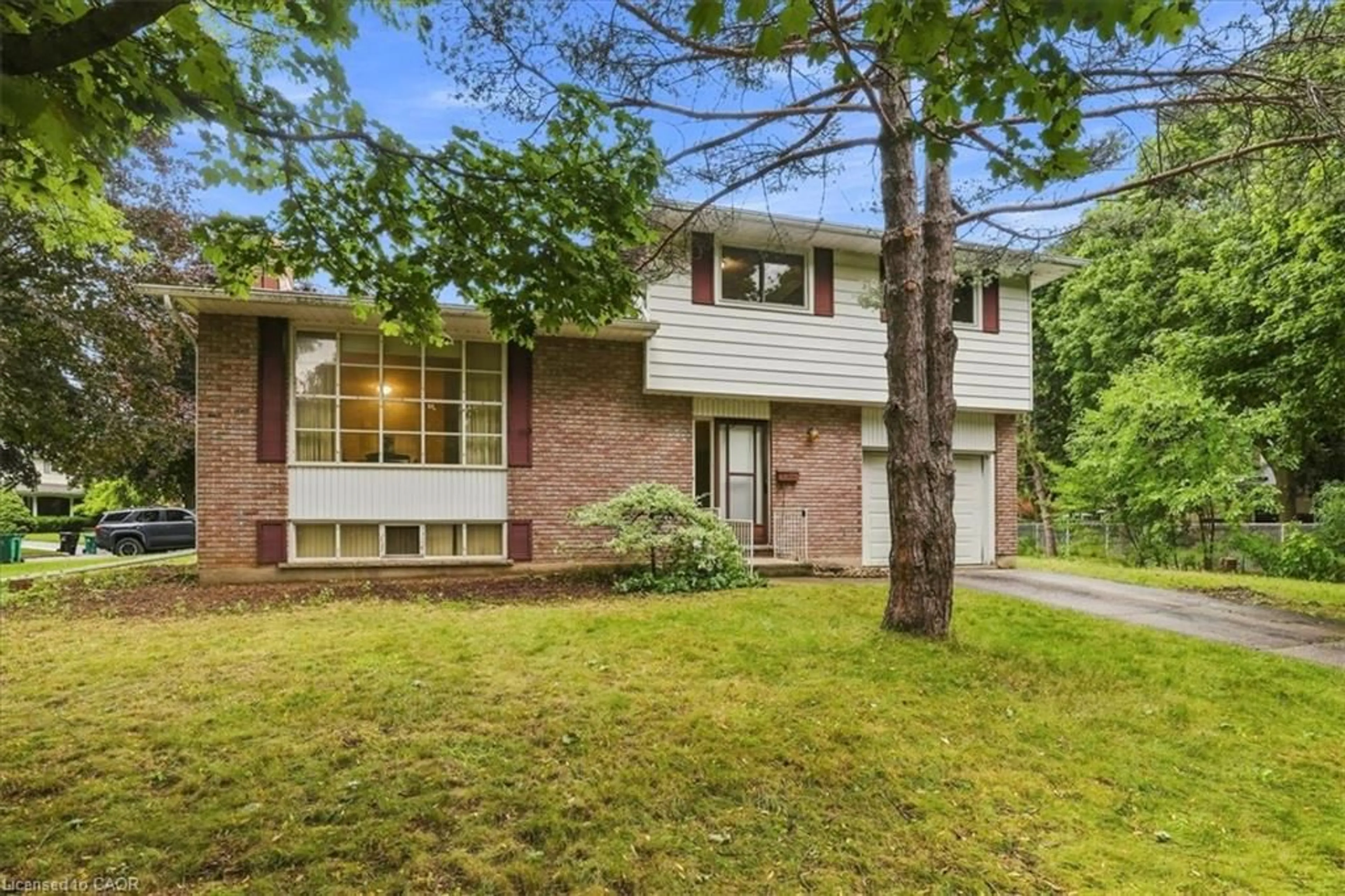 Home with brick exterior material, street for 395 Mossom Pl, Waterloo Ontario N2K 2G7