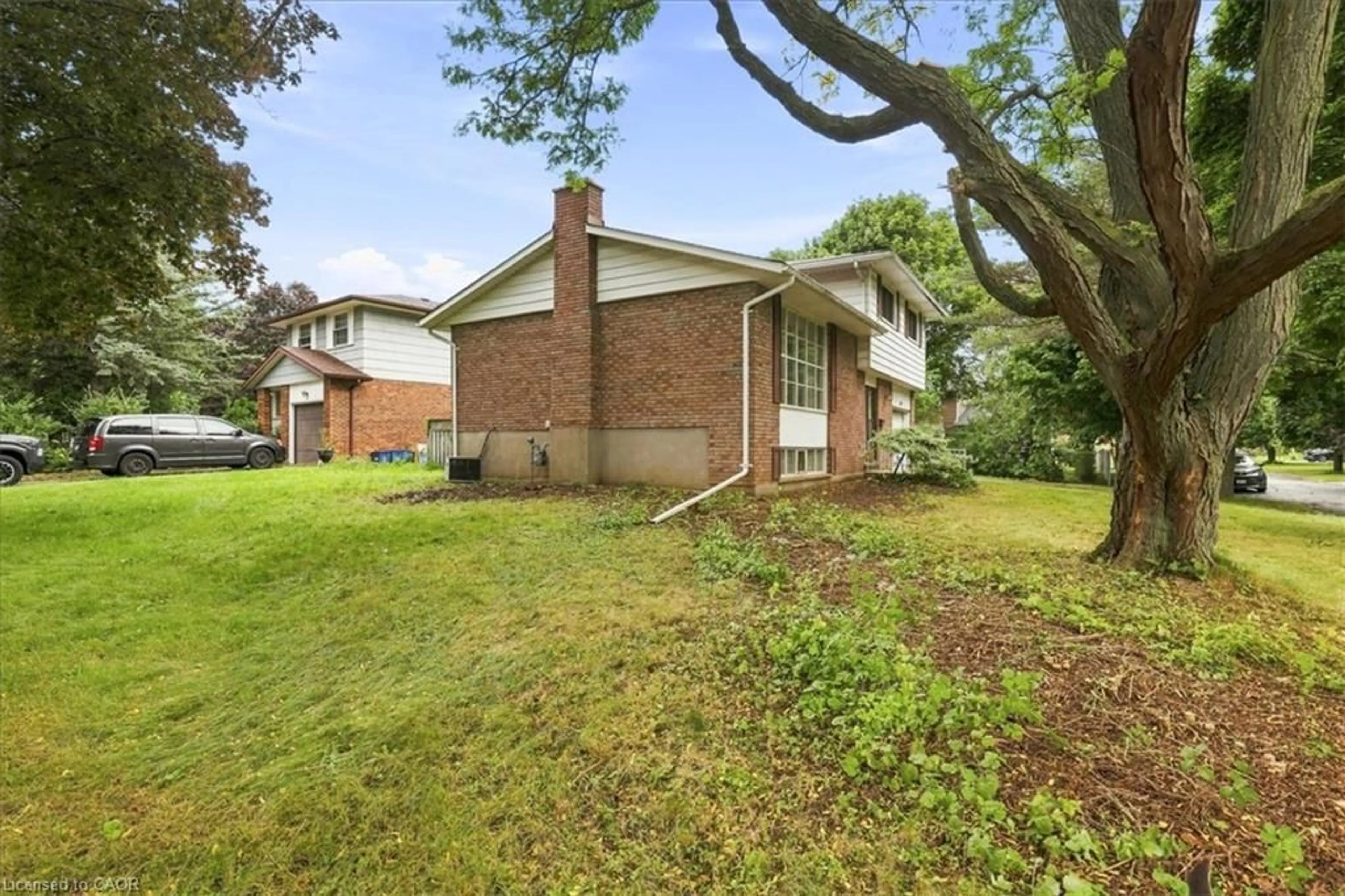 Home with brick exterior material, street for 395 Mossom Pl, Waterloo Ontario N2K 2G7