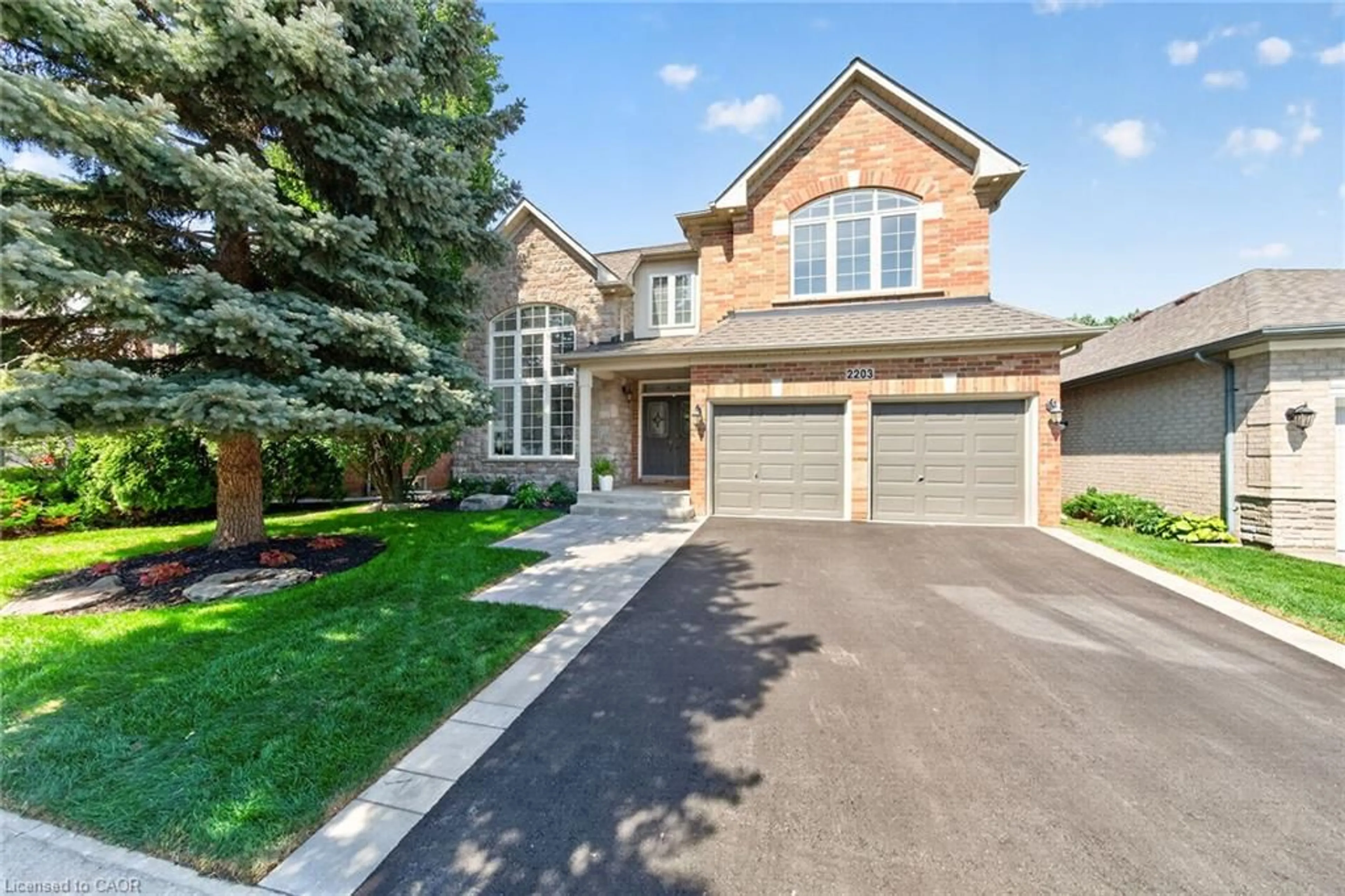 Home with brick exterior material, street for 2203 Turnberry Rd, Burlington Ontario L7M 4P9