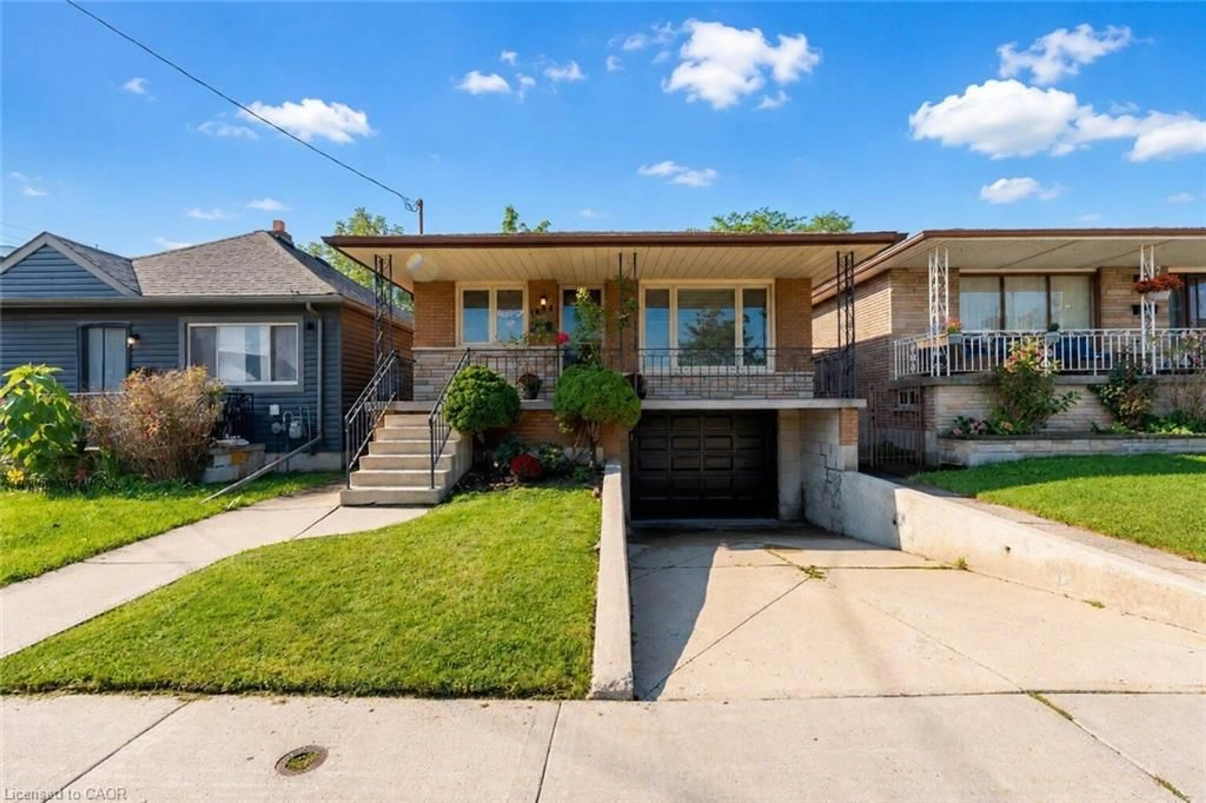 Home with brick exterior material, street for 1894 Main St, Hamilton Ontario L8H 1G5