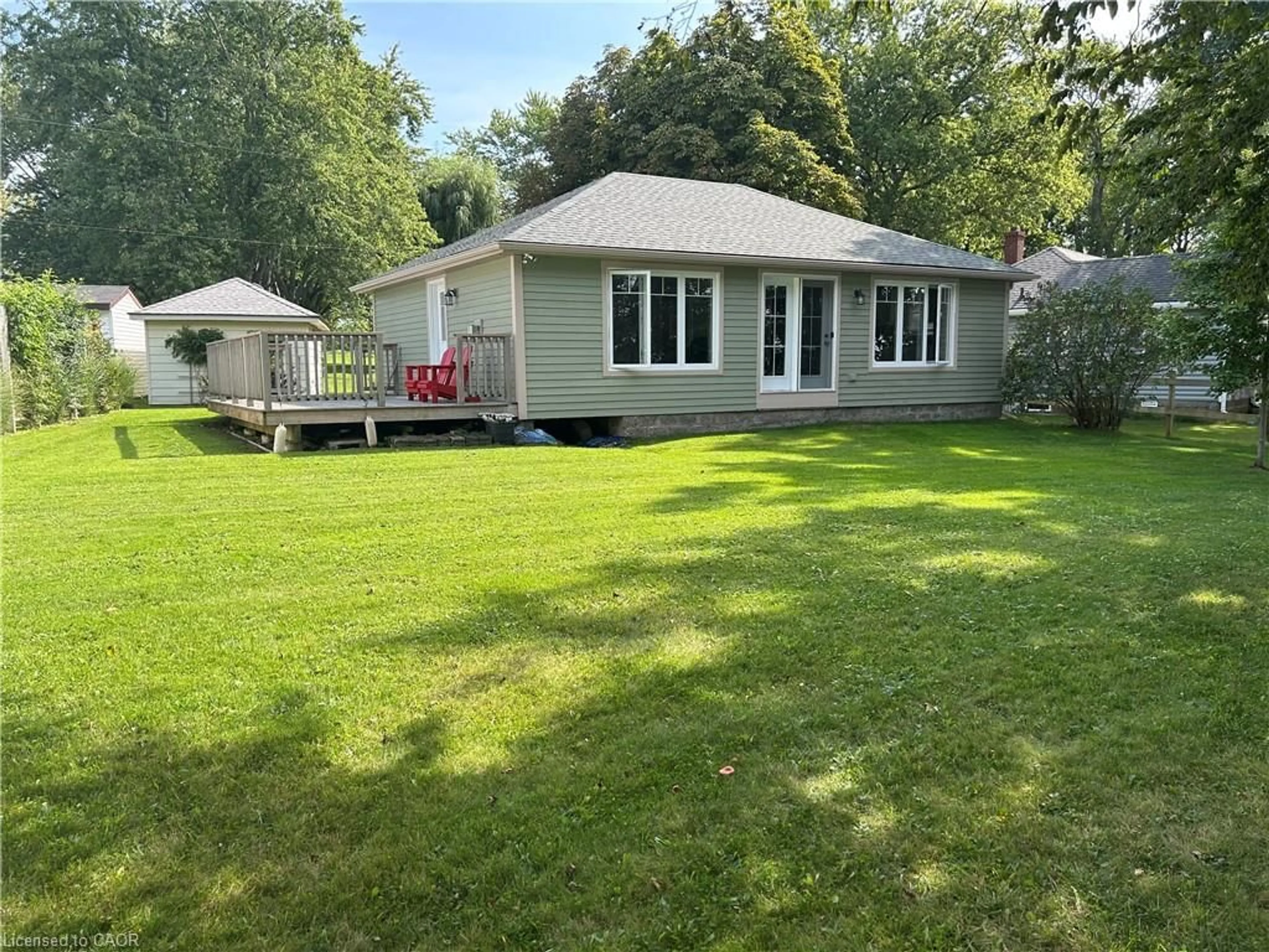 A pic from outside/outdoor area/front of a property/back of a property/a pic from drone, water/lake/river/ocean view for 23 Upper Mohawk Pt, Lowbanks Ontario N0A 1K0
