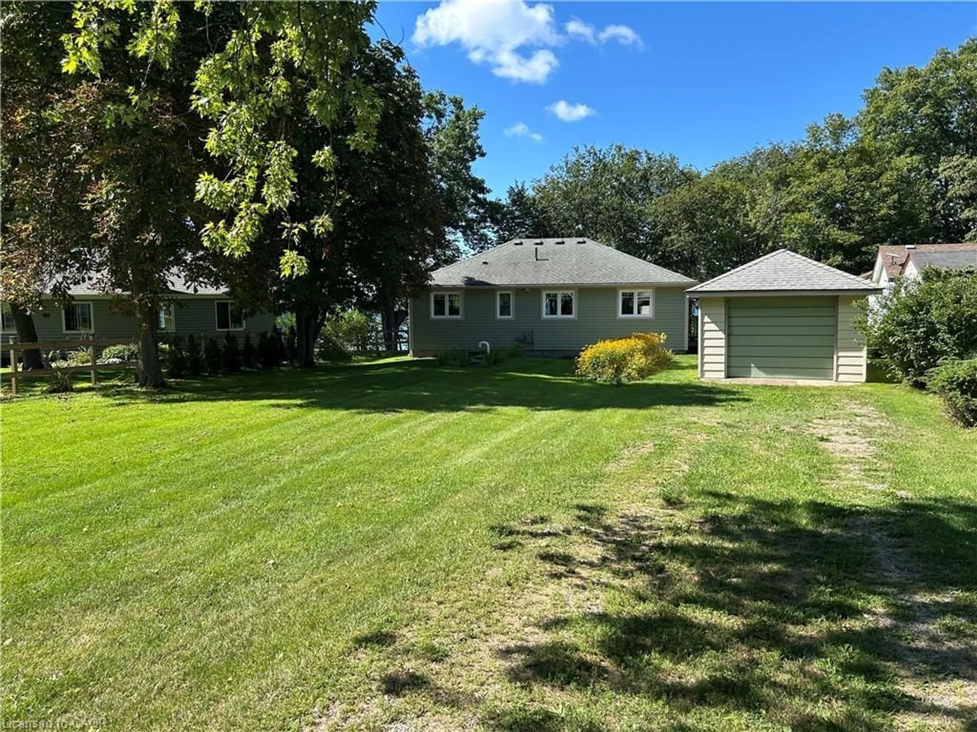 A pic from outside/outdoor area/front of a property/back of a property/a pic from drone, water/lake/river/ocean view for 23 Upper Mohawk Pt, Lowbanks Ontario N0A 1K0