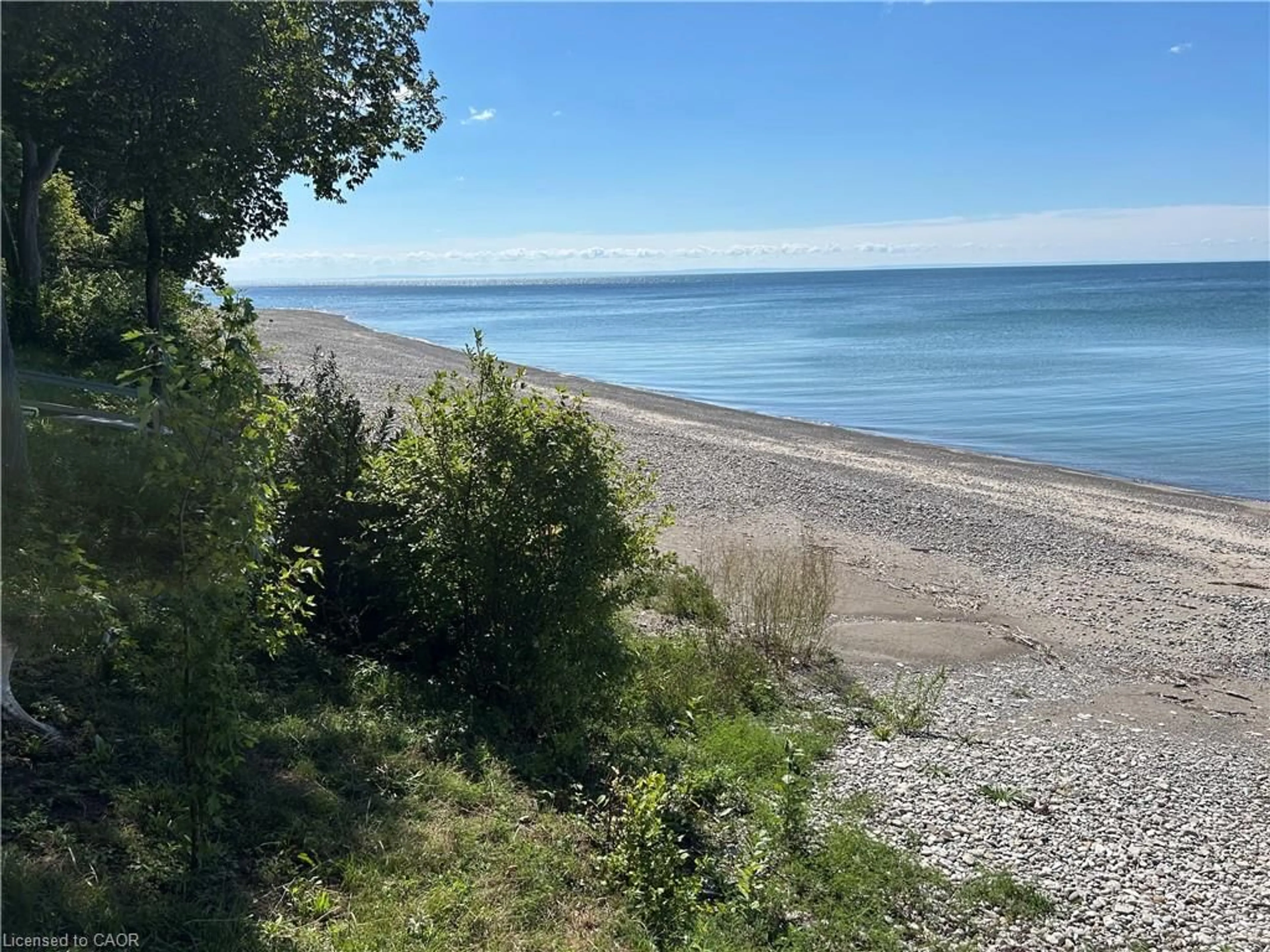 A pic from outside/outdoor area/front of a property/back of a property/a pic from drone, water/lake/river/ocean view for 23 Upper Mohawk Pt, Lowbanks Ontario N0A 1K0