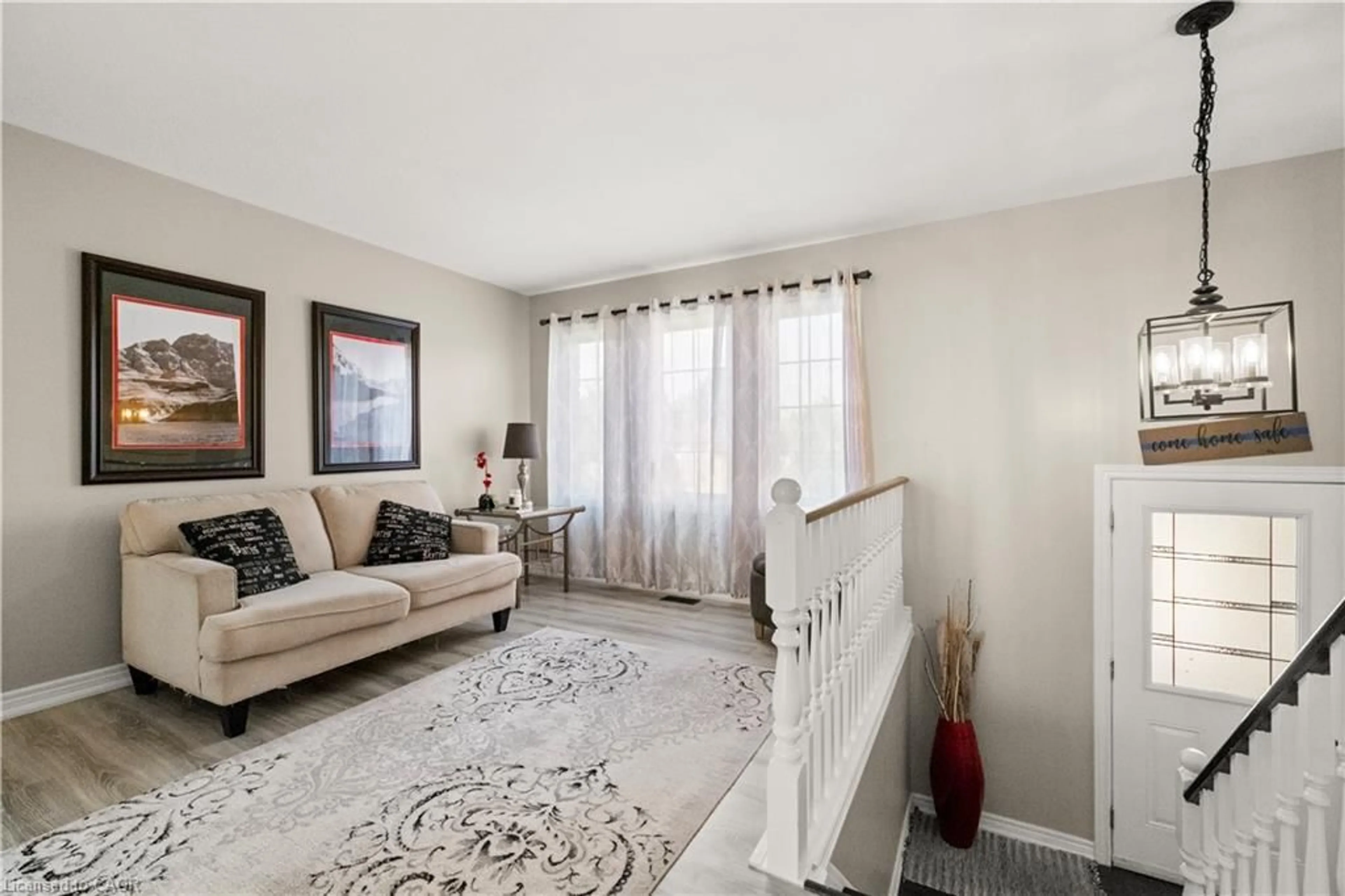 Living room with furniture, carpet floor for 63 Donegal Dr, Brantford Ontario N3T 6L2