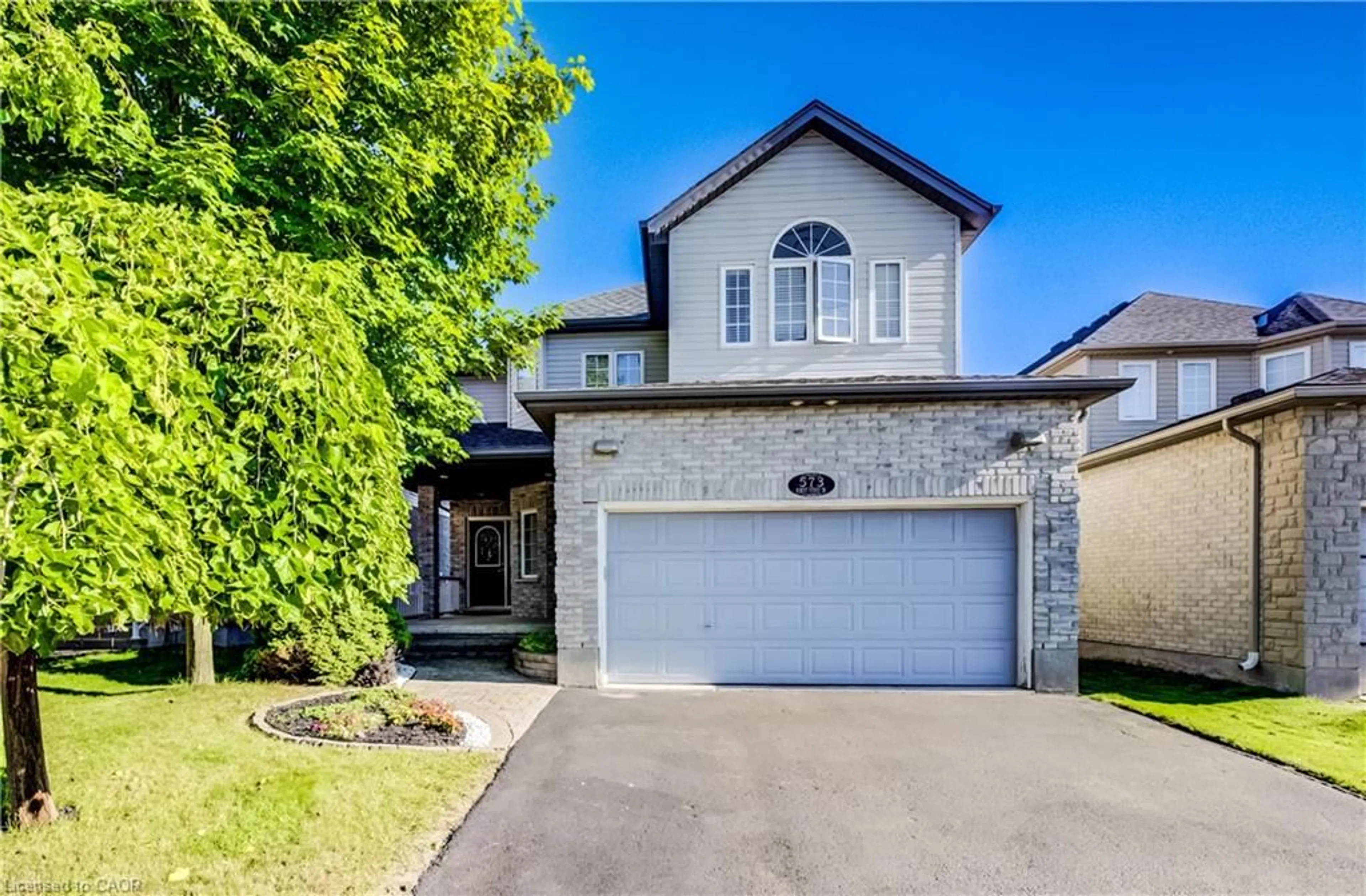 Home with brick exterior material, street for 573 Robert Ferrie Dr, Kitchener Ontario N2P 2T8