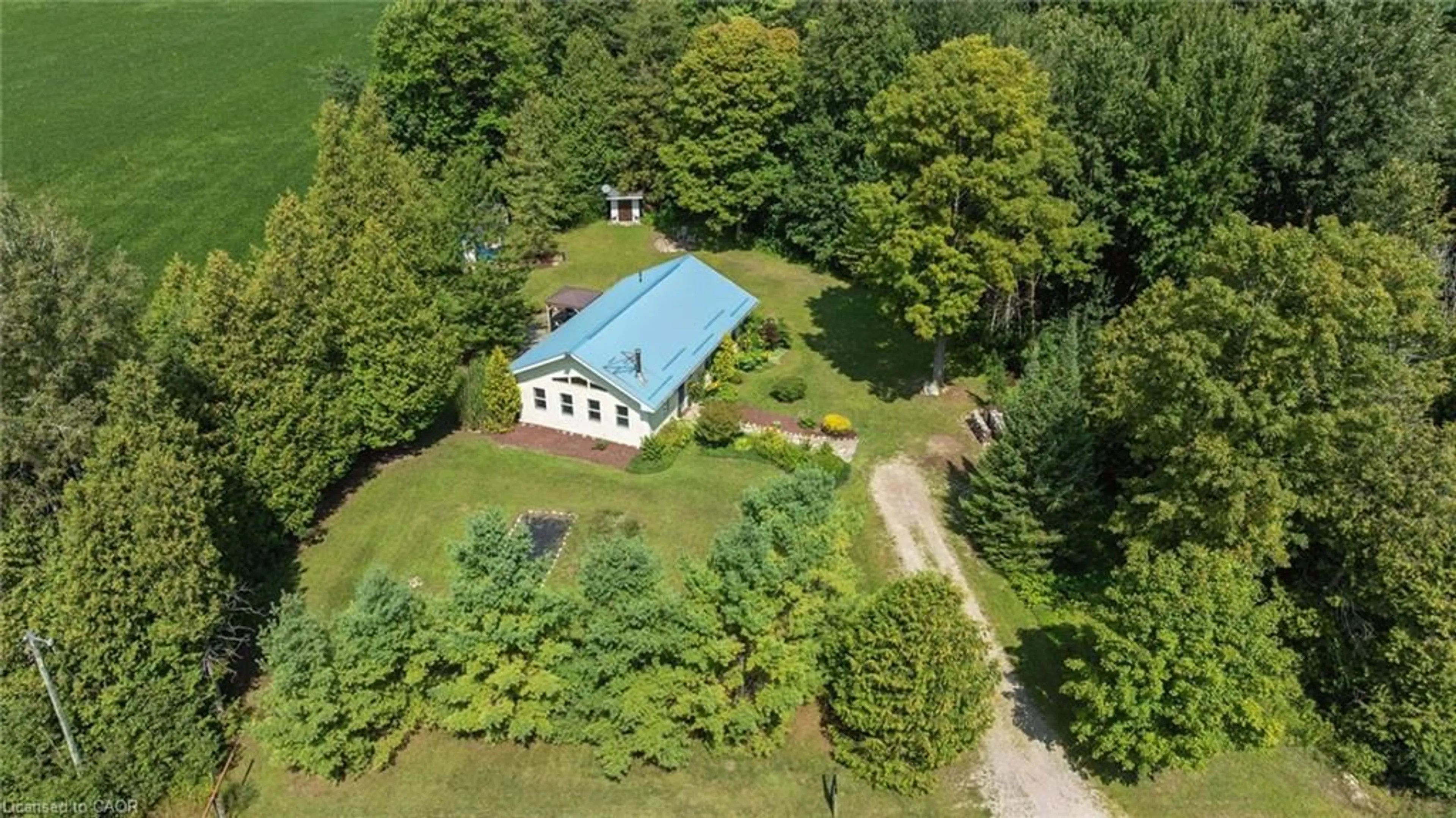 A pic from outside/outdoor area/front of a property/back of a property/a pic from drone, unknown for 5578 11th Line, Harriston Ontario N0G 1Z0