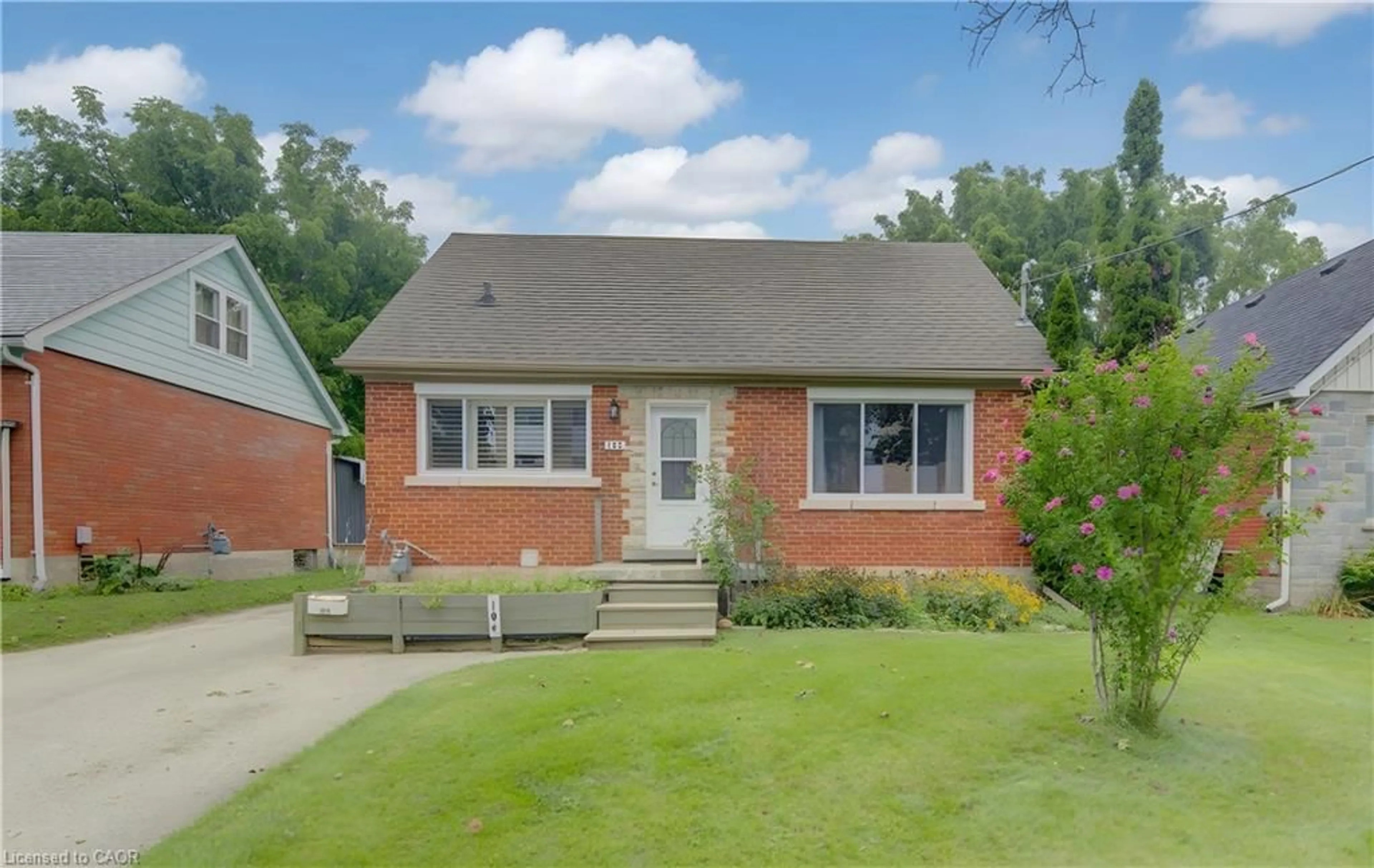 Home with brick exterior material, street for 104 Mausser Ave, Kitchener Ontario N2M 3K5