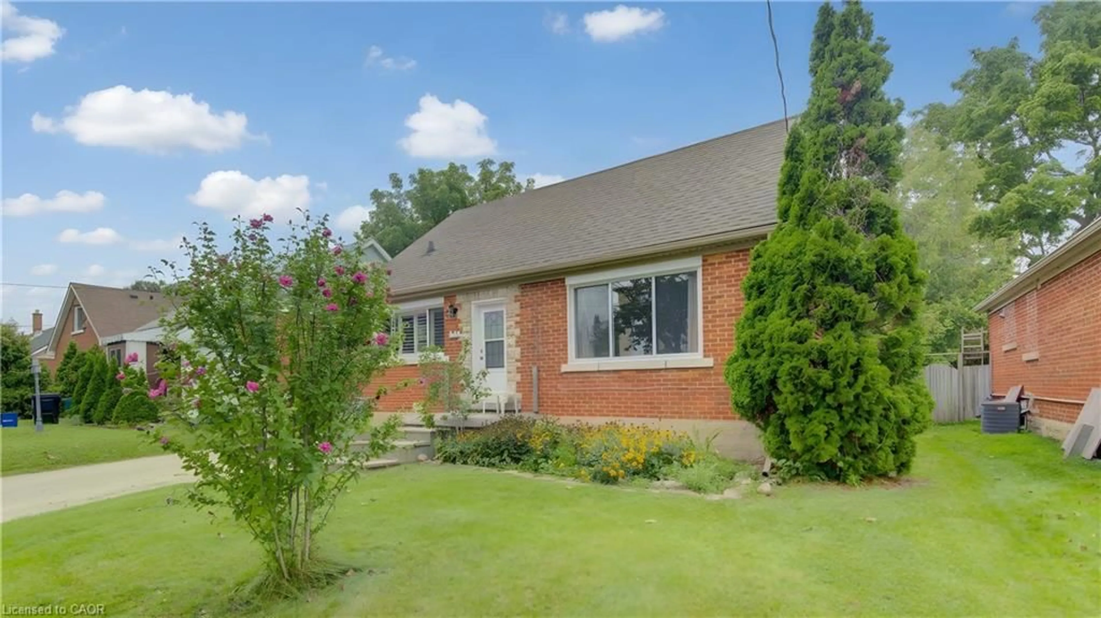 Home with brick exterior material, street for 104 Mausser Ave, Kitchener Ontario N2M 3K5