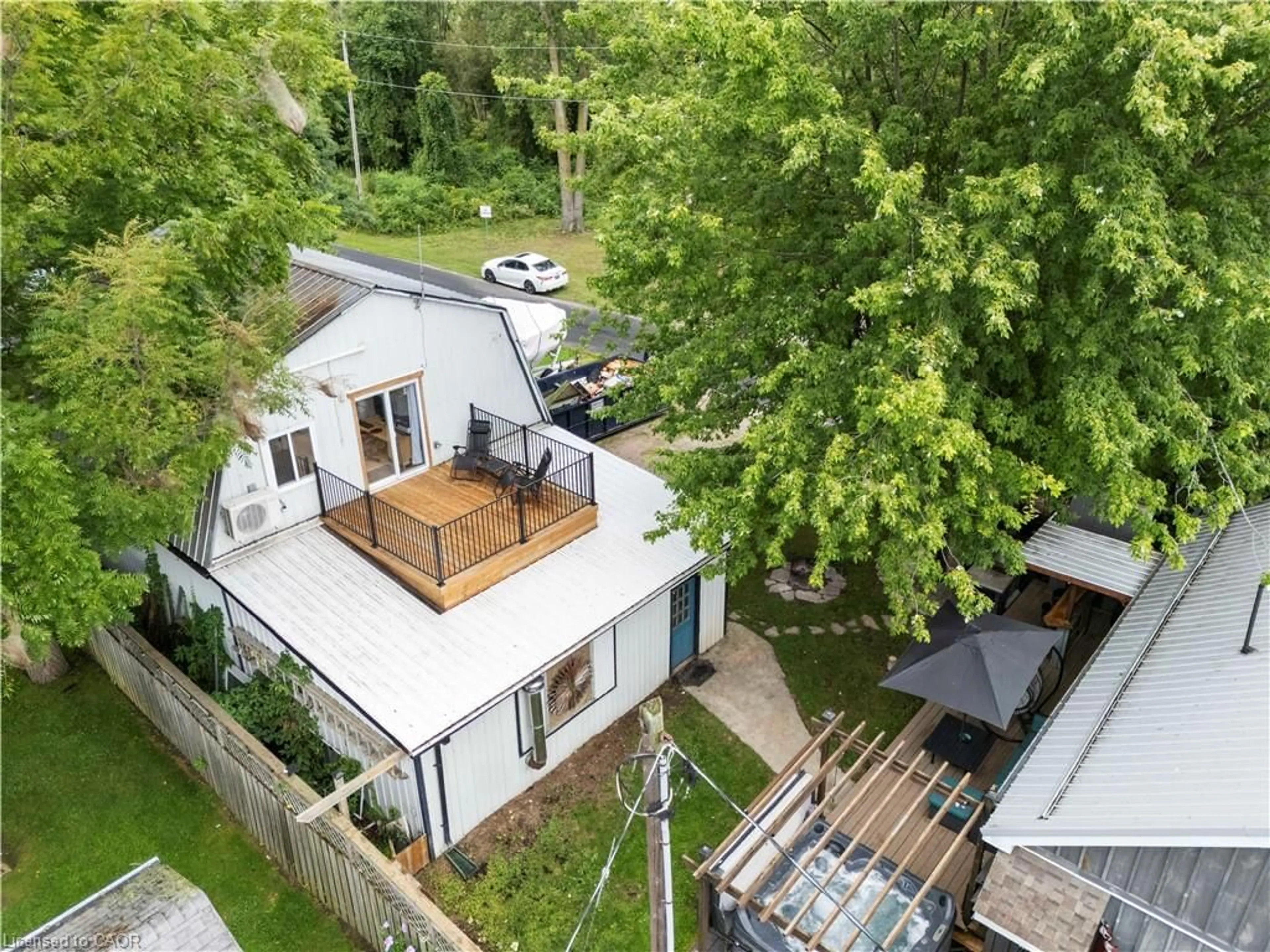 A pic from outside/outdoor area/front of a property/back of a property/a pic from drone, street for 14 Howey Ave, Long Point Ontario N0E 1M0