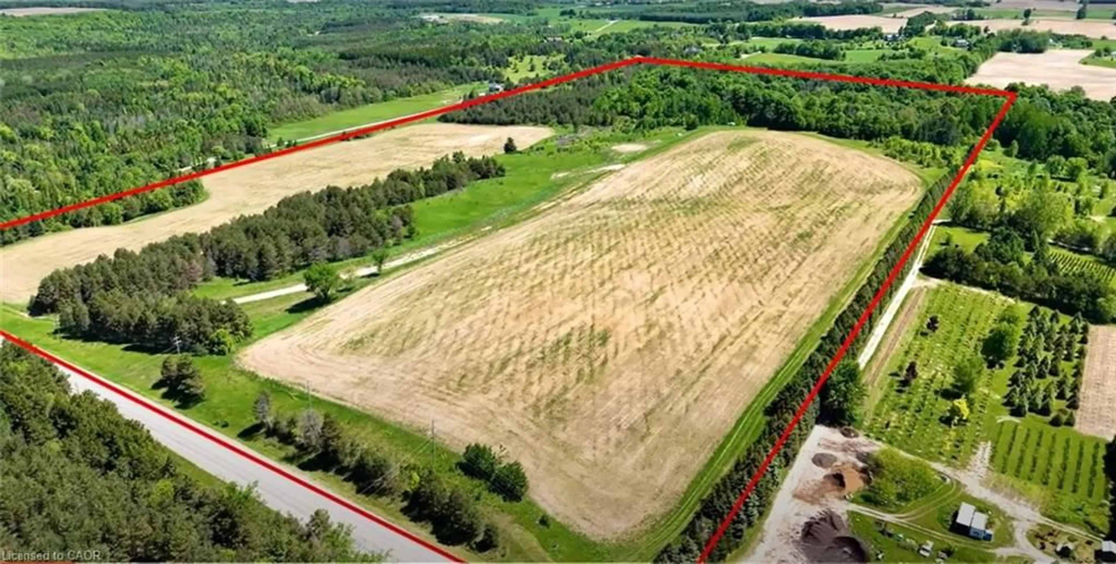 A pic from outside/outdoor area/front of a property/back of a property/a pic from drone, forest/trees view for 938453 Airport Rd R Rd, Mulmur Ontario L0M 1K0
