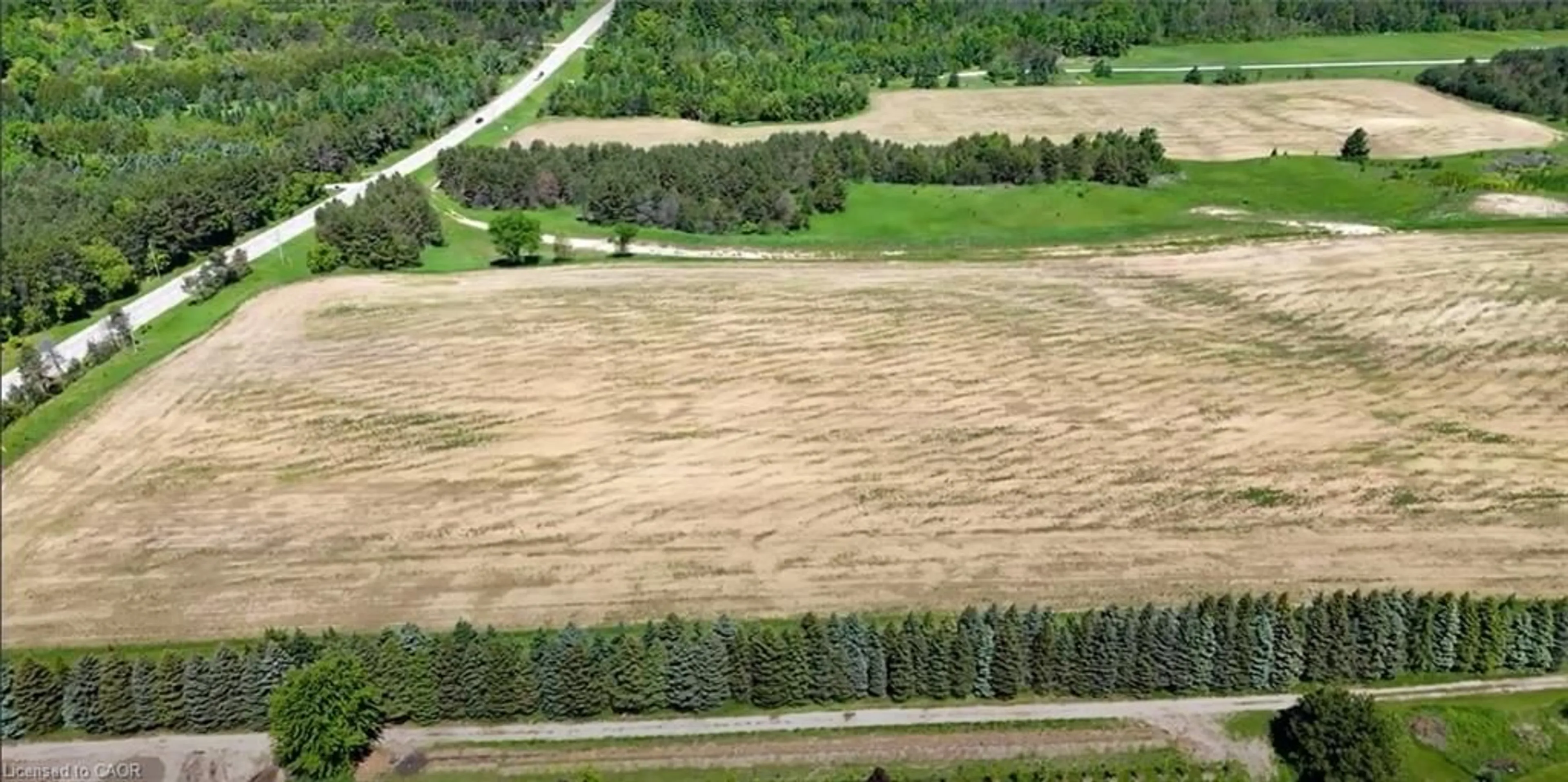 A pic from outside/outdoor area/front of a property/back of a property/a pic from drone, forest/trees view for 938453 Airport Rd R Rd, Mulmur Ontario L0M 1K0