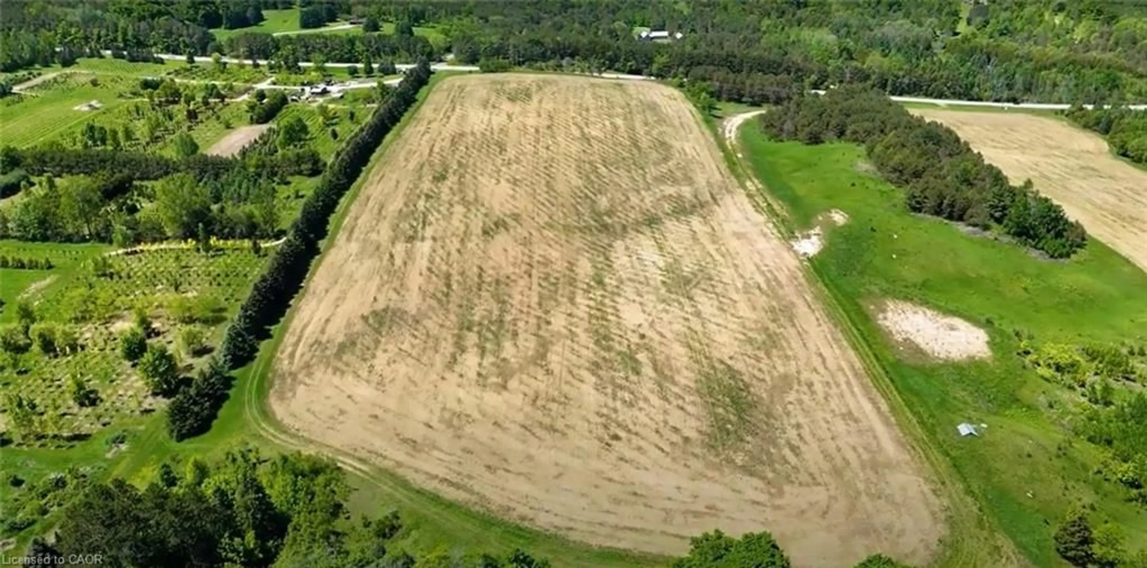 A pic from outside/outdoor area/front of a property/back of a property/a pic from drone, building for 938453 Airport Rd R Rd, Mulmur Ontario L0M 1K0