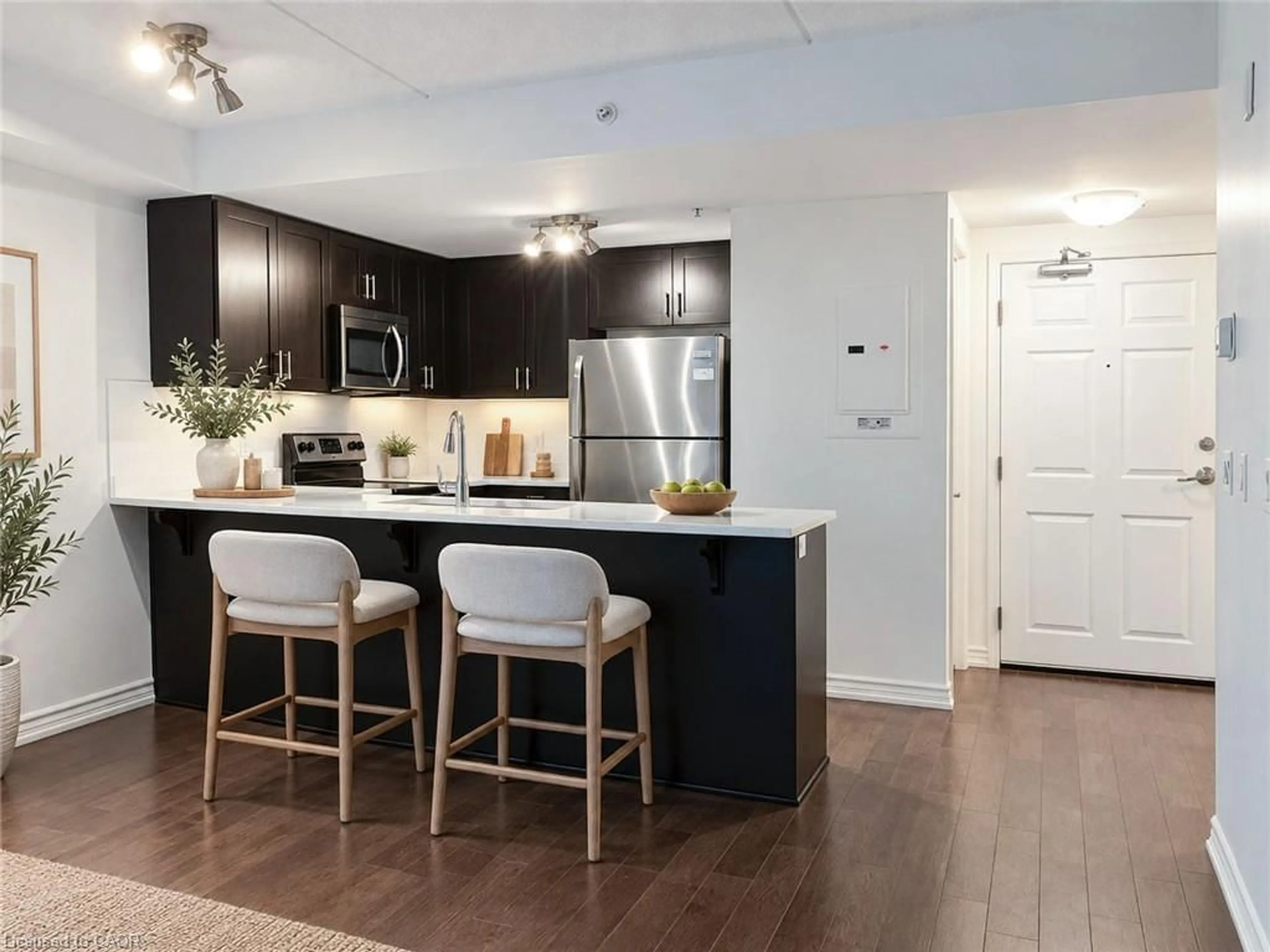 Open concept kitchen, wood/laminate floor for 50 Bryan Crt #LL05, Kitchener Ontario N2A 4N4