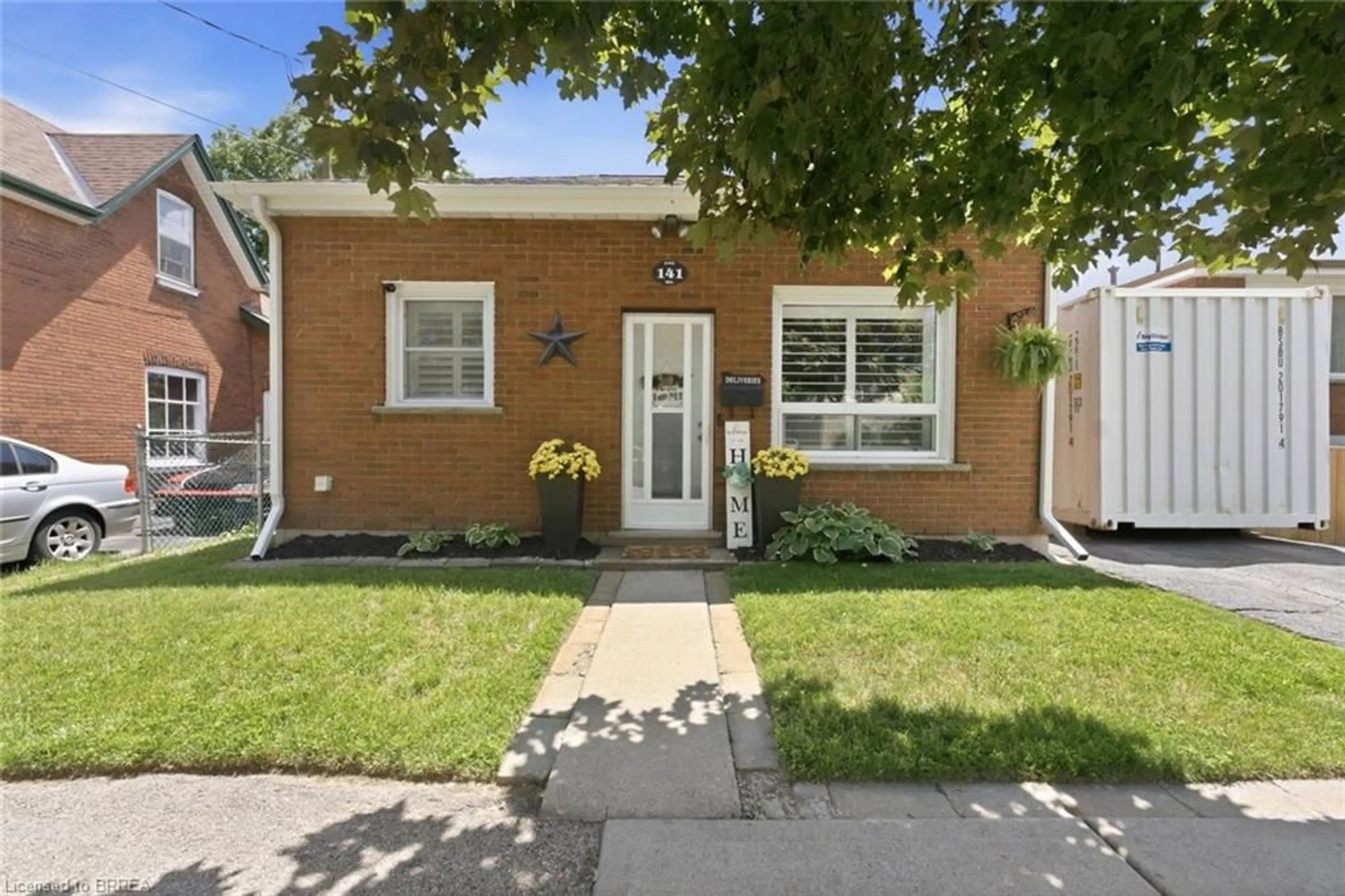 Home with brick exterior material, street for 141 East Ave, Brantford Ontario N3S 3M3