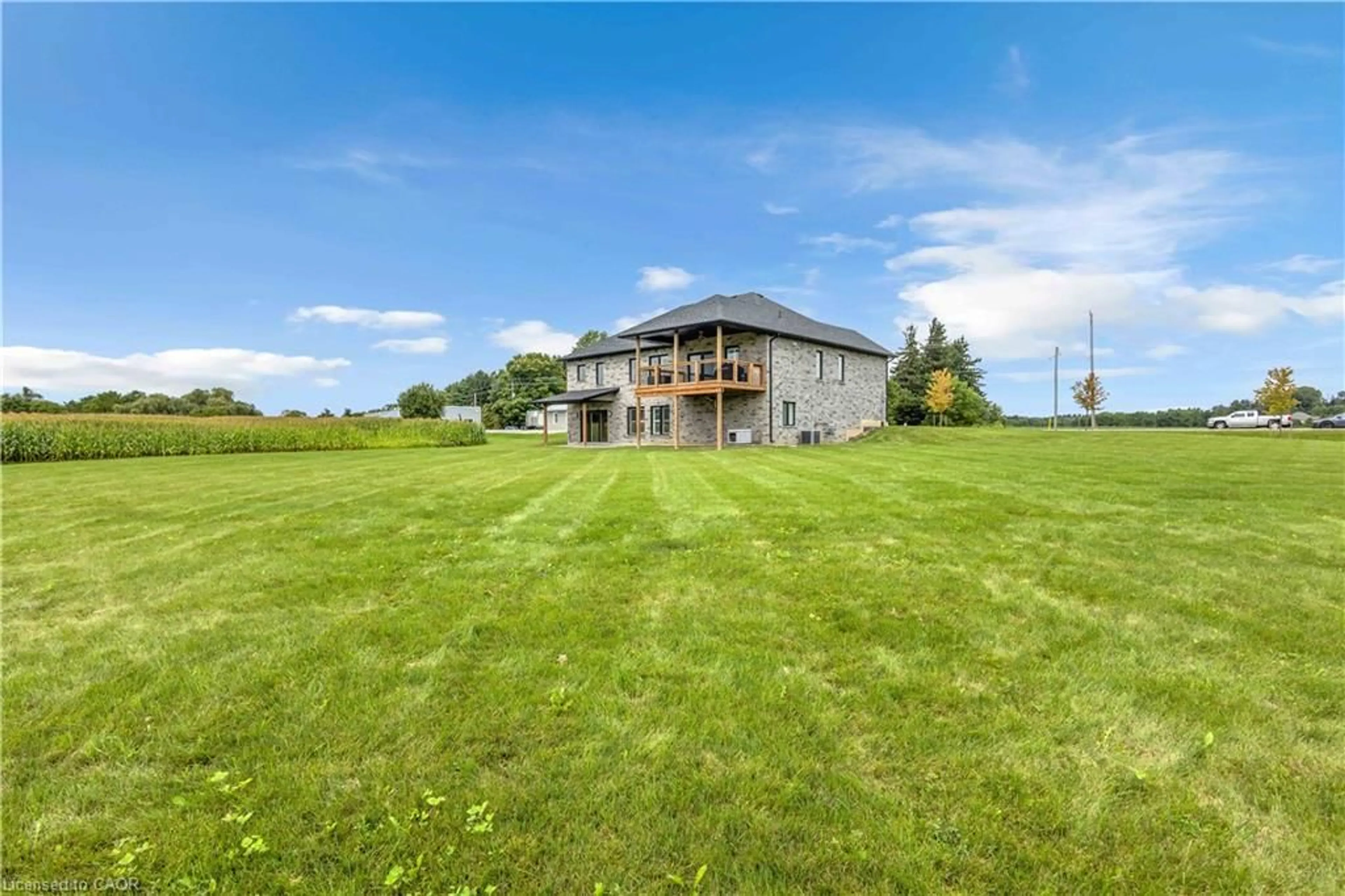 A pic from outside/outdoor area/front of a property/back of a property/a pic from drone, water/lake/river/ocean view for 1410 Thompson Rd, Waterford Ontario N0E 1Y0