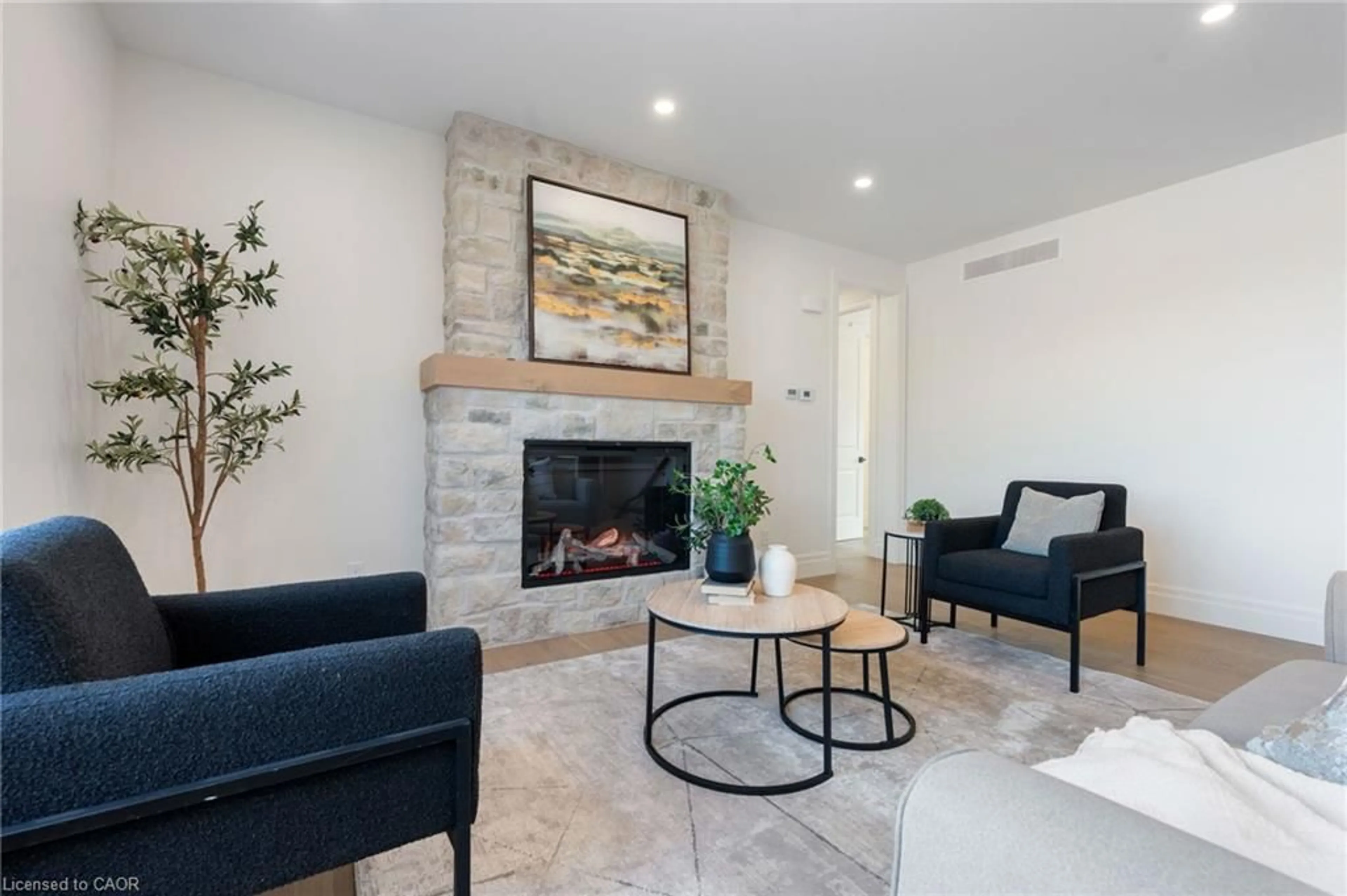 Living room with furniture, ceramic/tile floor for 2427 East Quarter Line, Delhi Ontario N4B 2W4