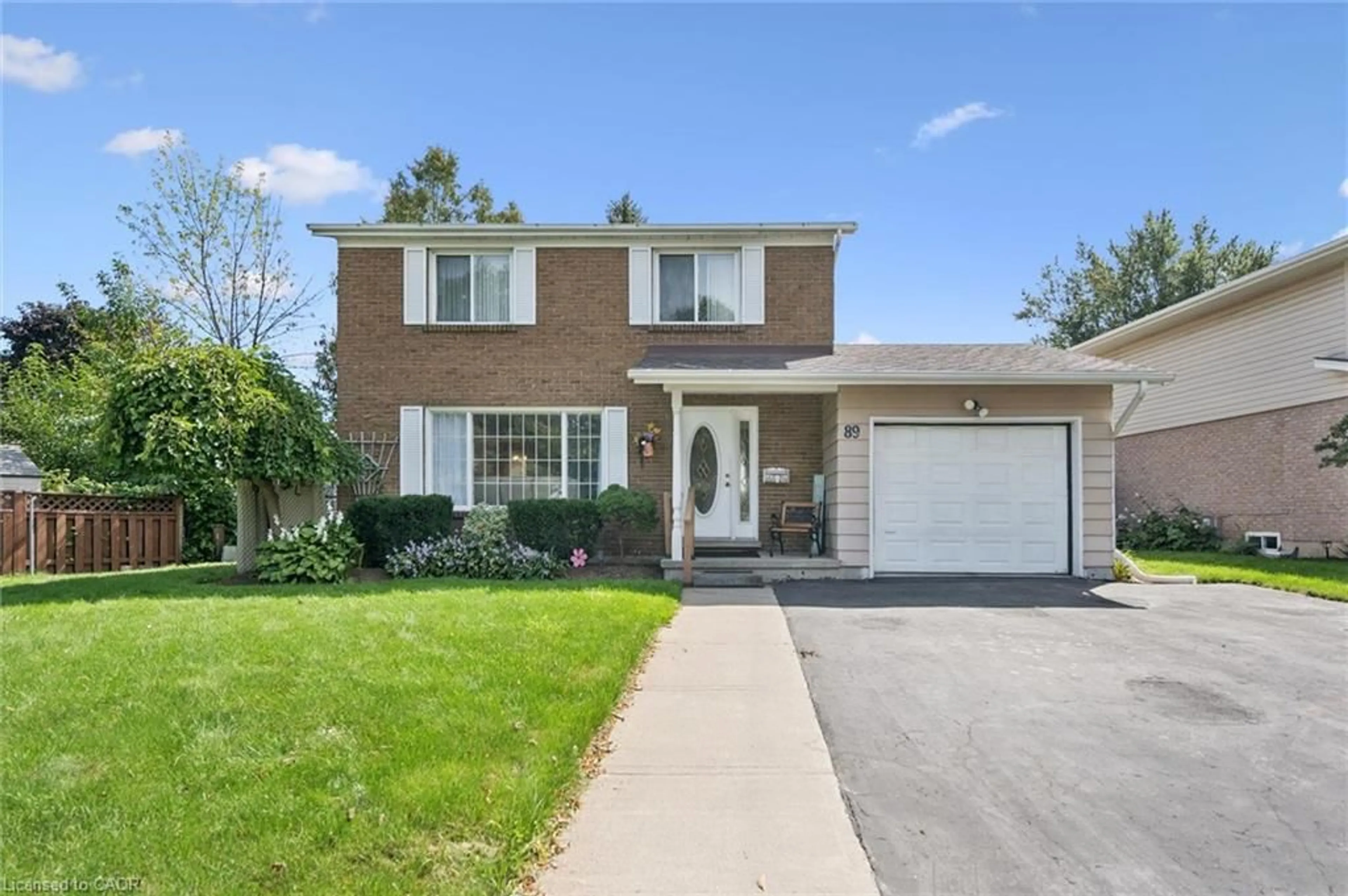 Home with brick exterior material, street for 89 Kingswood Dr, Kitchener Ontario N2E 1A9