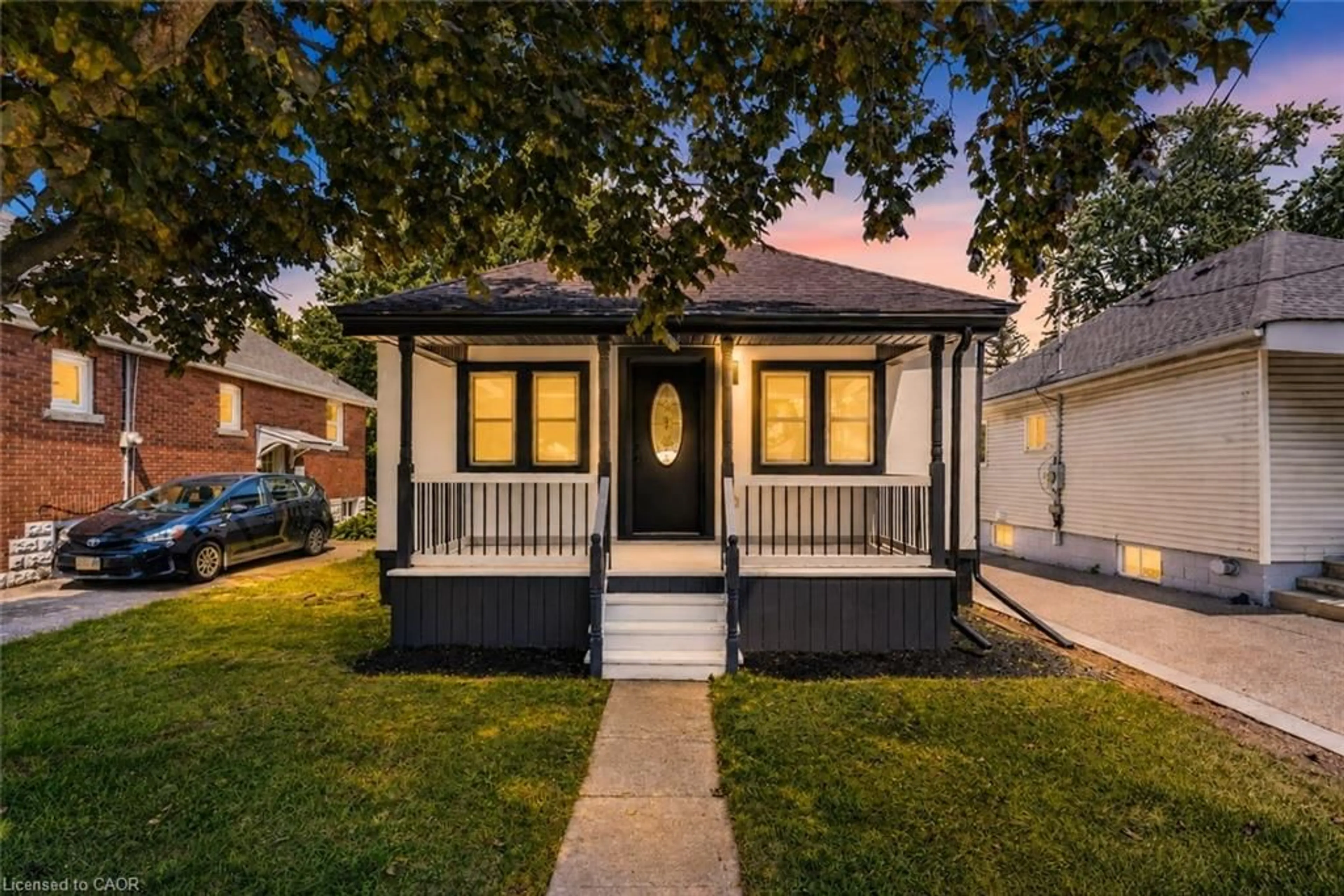 Home with vinyl exterior material, street for 43 Brucedale Ave, Hamilton Ontario L9A 1N1