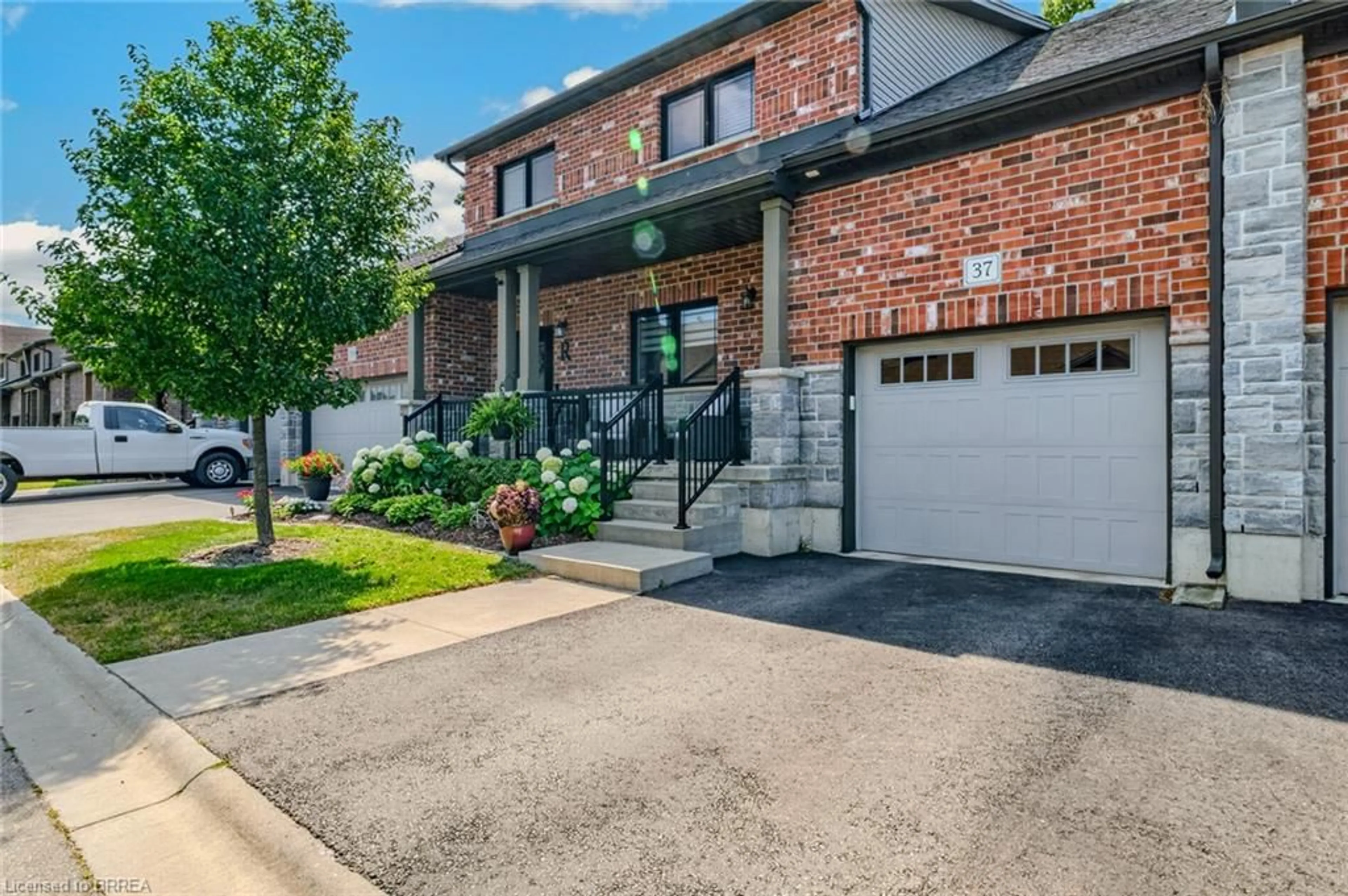 Home with brick exterior material, street for 37 Serviceberry Lane, Simcoe Ontario N3Y 0E5