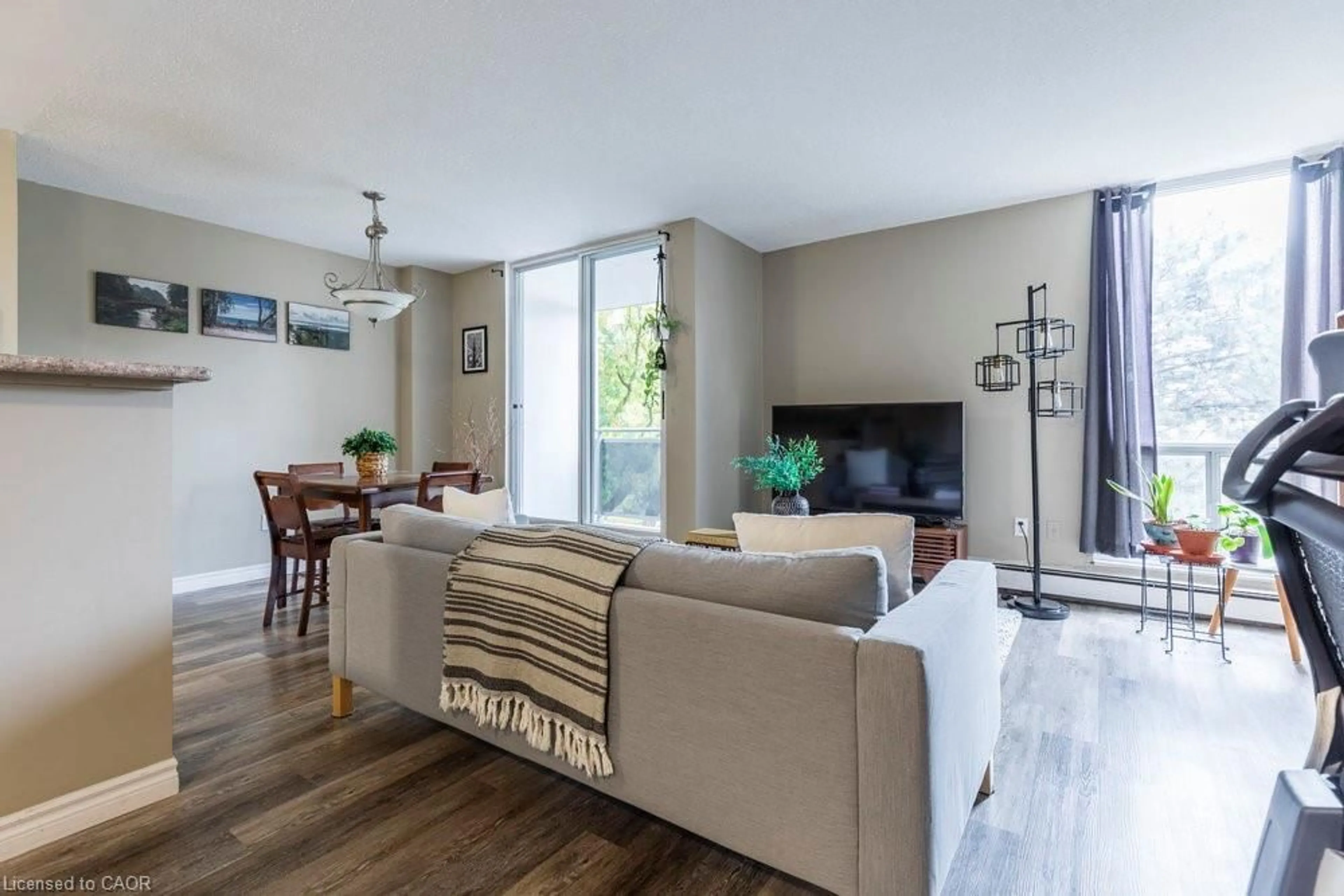 Living room with furniture, unknown for 75 Glenburn Crt #409, Hamilton Ontario L8E 1C7
