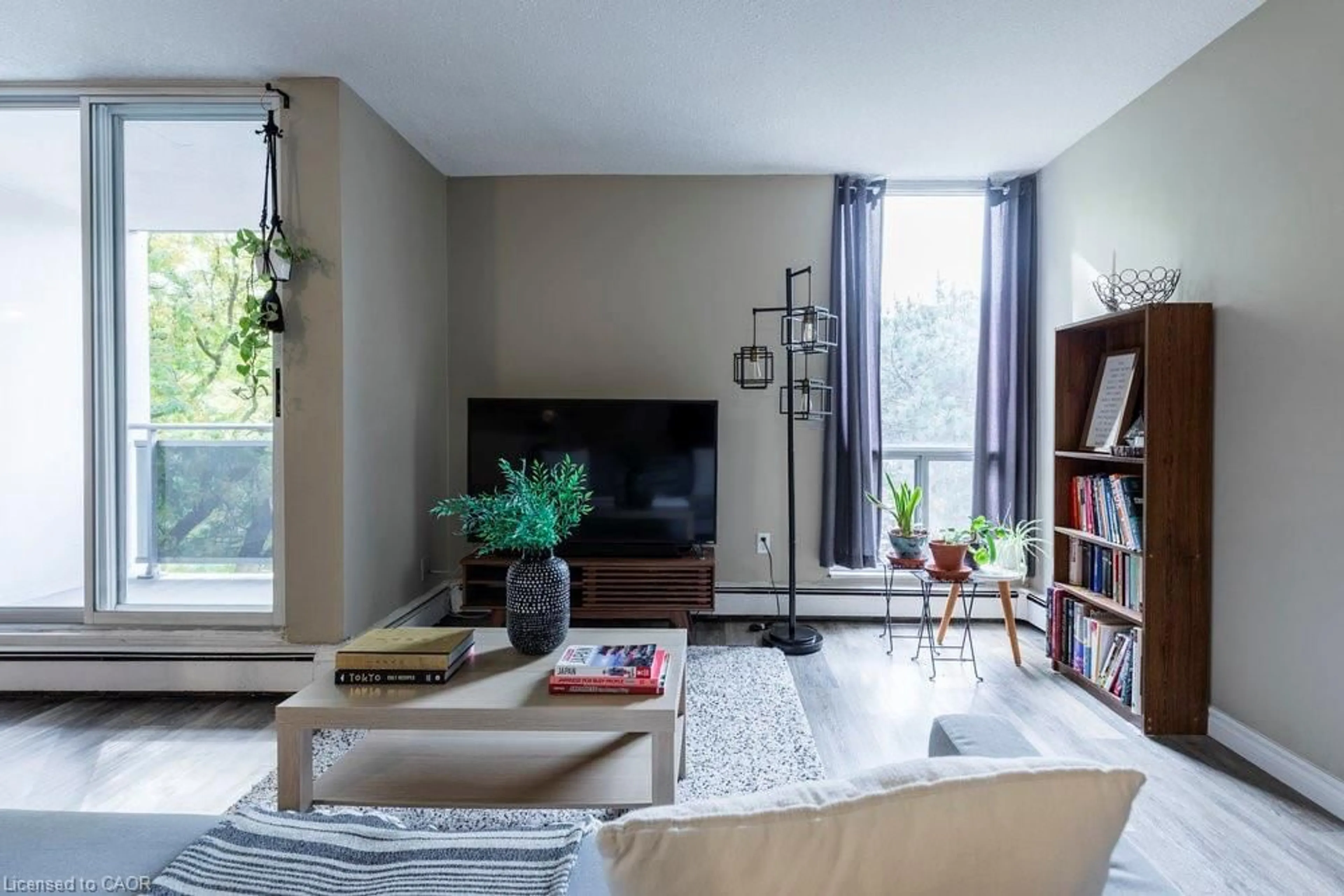 Living room with furniture, unknown for 75 Glenburn Crt #409, Hamilton Ontario L8E 1C7