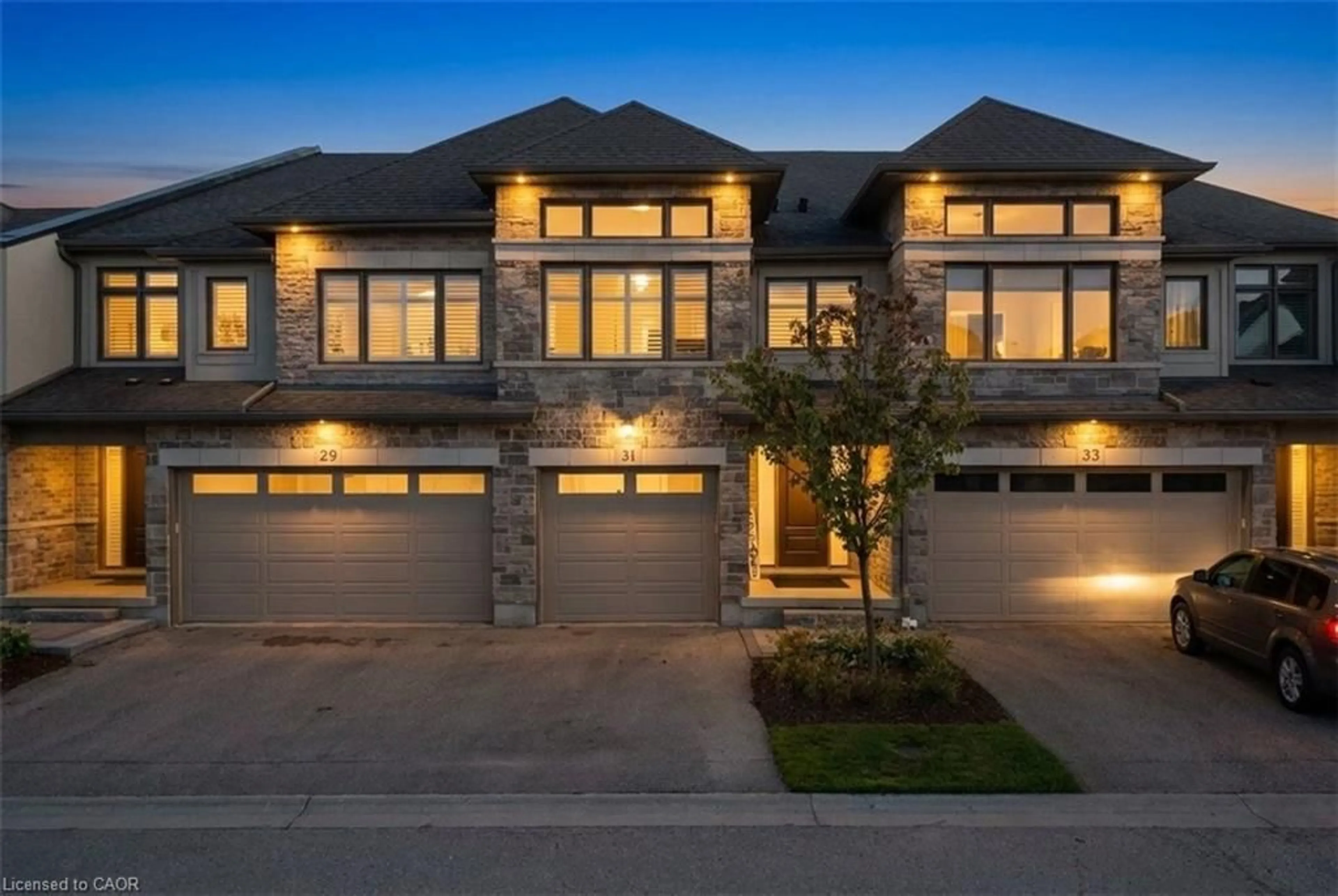 Home with brick exterior material, street for 243 Grey Silo Rd #31, Waterloo Ontario N2K 0B9