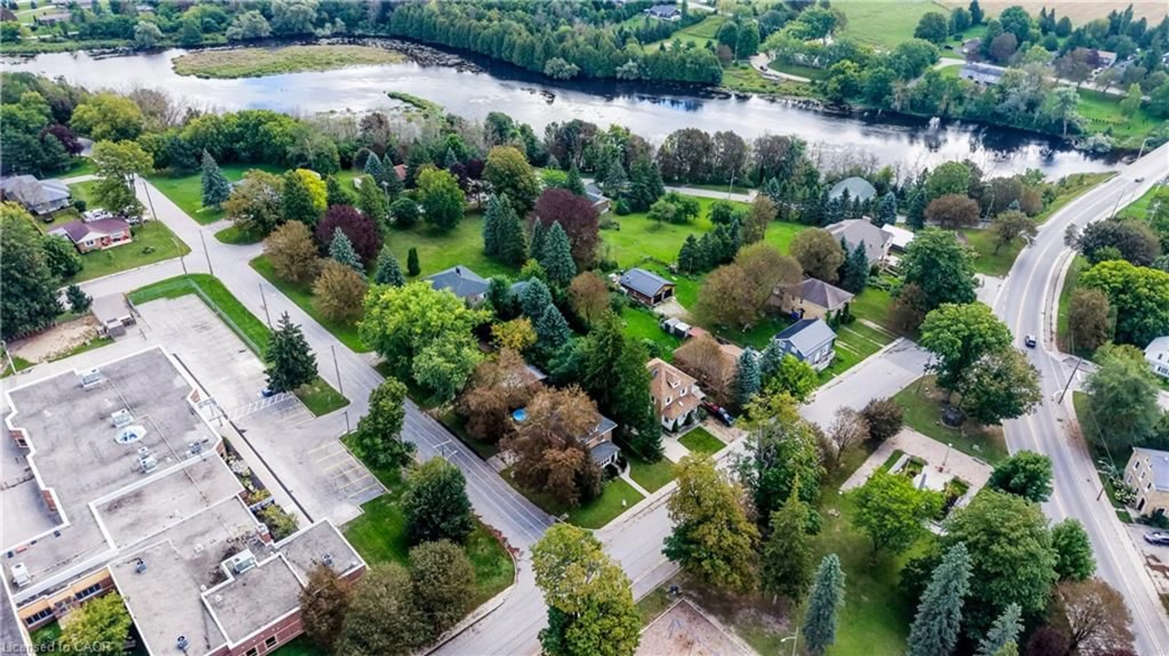 A pic from outside/outdoor area/front of a property/back of a property/a pic from drone, water/lake/river/ocean view for 420 Parkside Dr, Mount Forest Ontario N0G 2L3