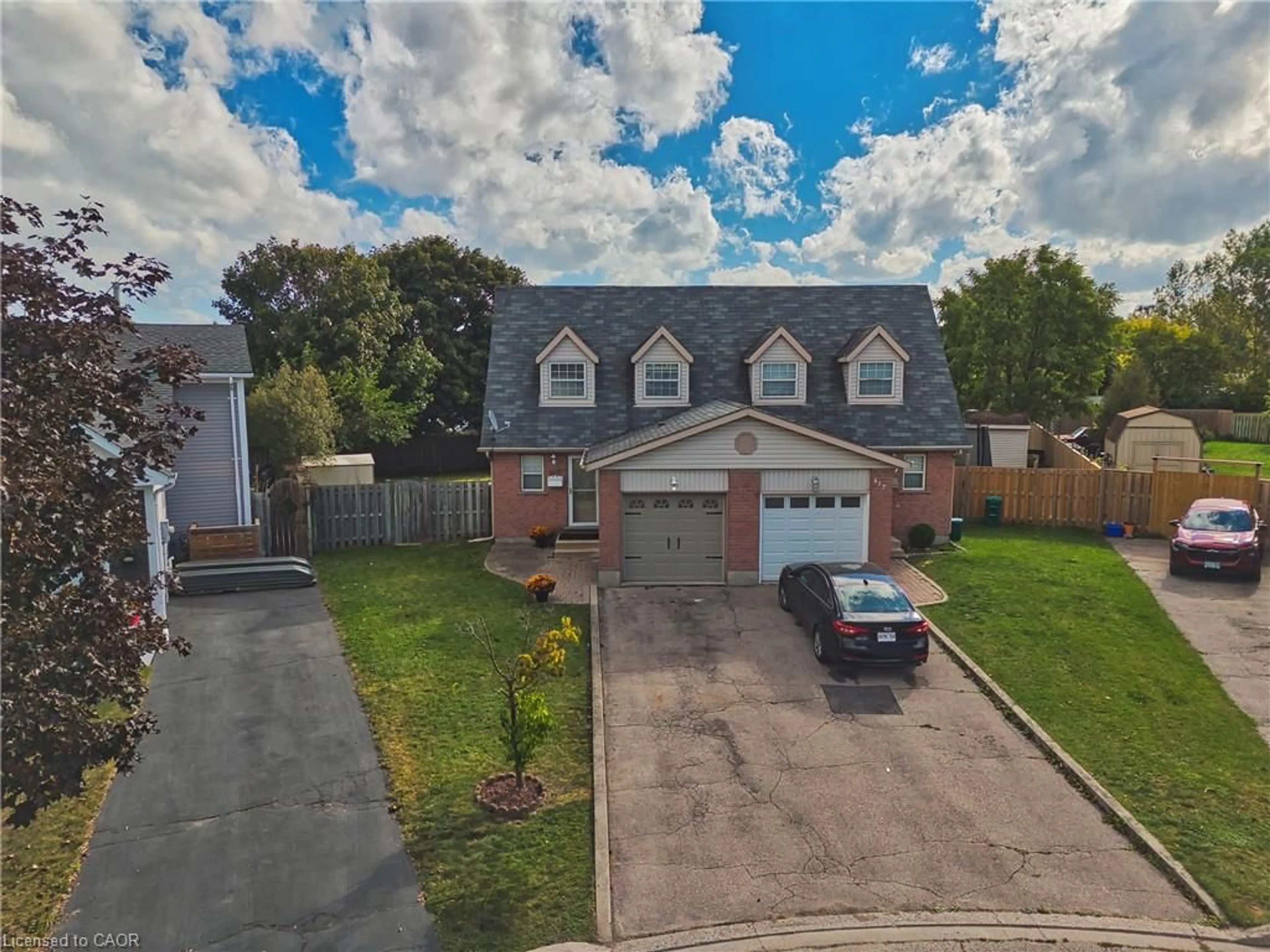 A pic from outside/outdoor area/front of a property/back of a property/a pic from drone, street for 415 Hadfield Crt, Cambridge Ontario N3H 5M4