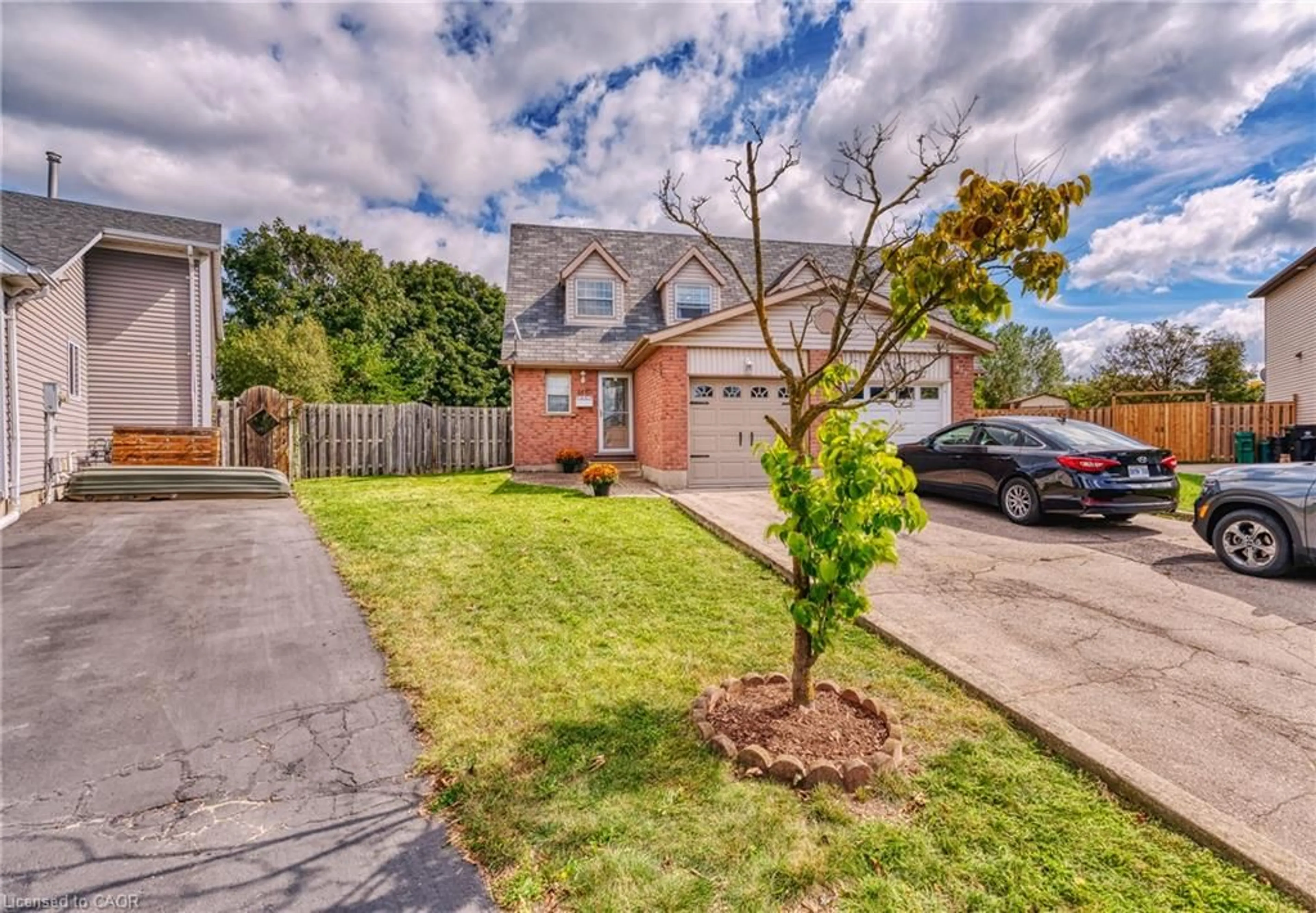 Home with brick exterior material, street for 415 Hadfield Crt, Cambridge Ontario N3H 5M4