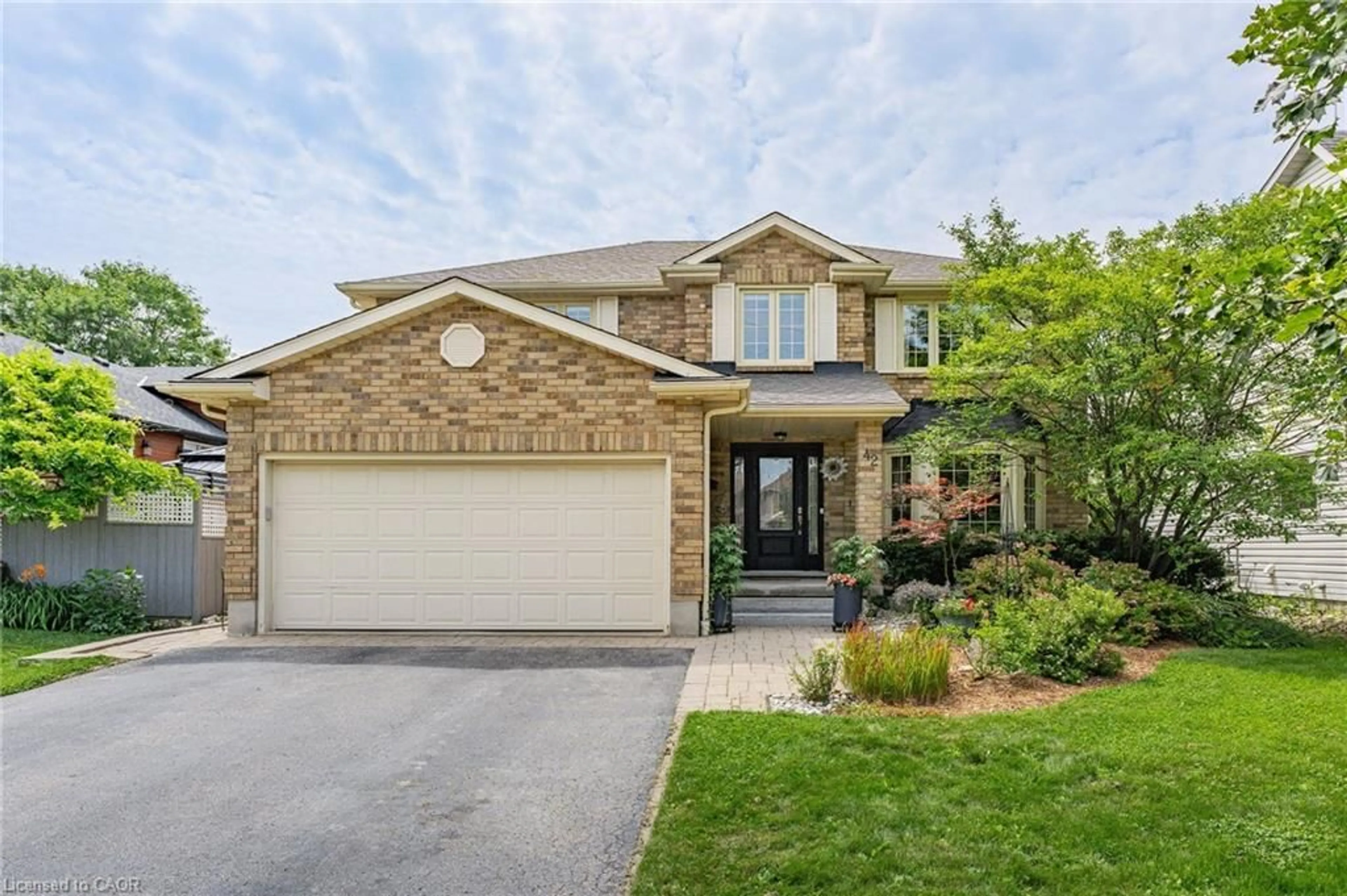 Home with brick exterior material, street for 42 Pacific Pl, Guelph Ontario N1G 4R5