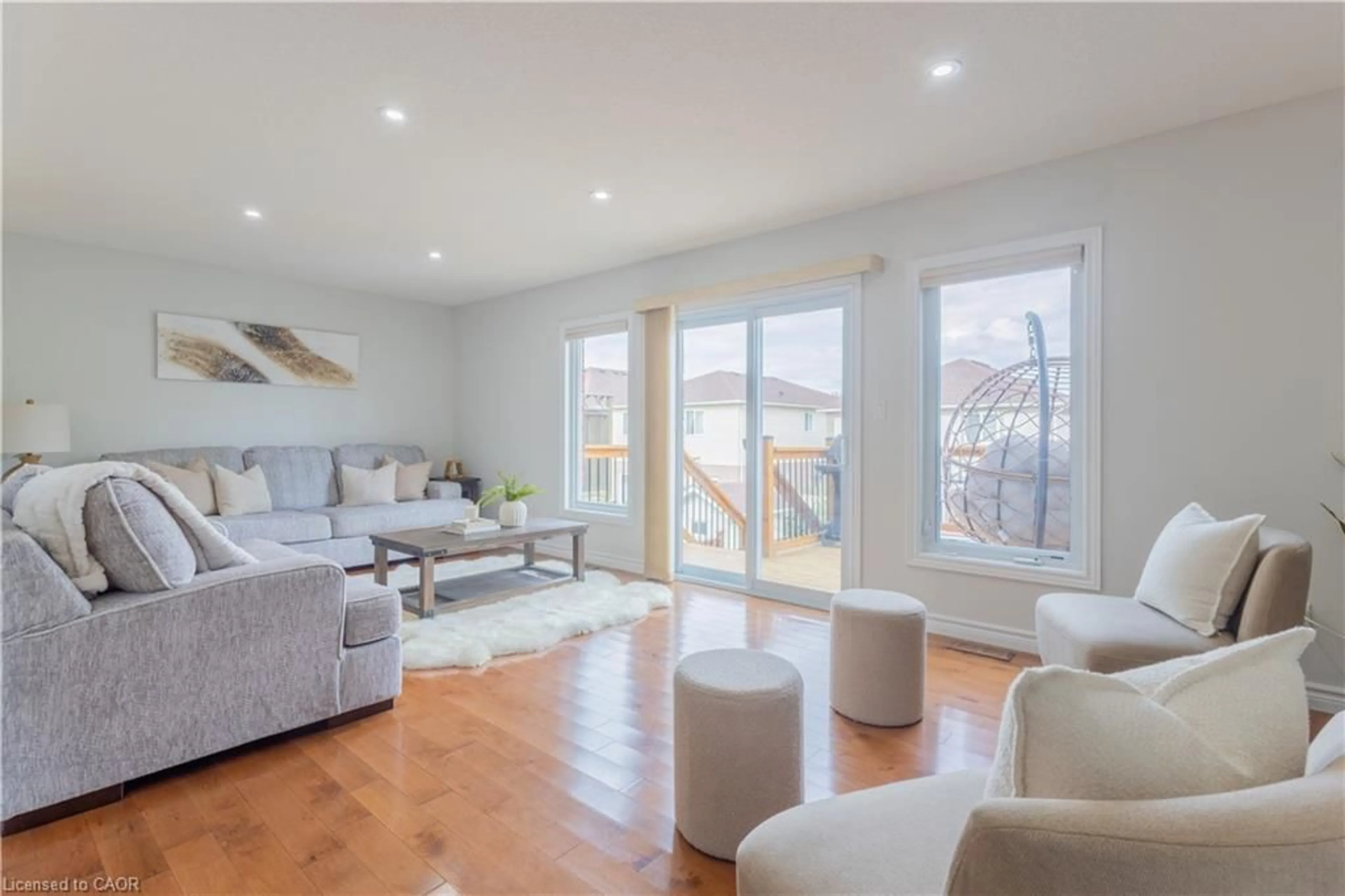 Living room with furniture, wood/laminate floor for 178 Huck Cres, Kitchener Ontario N2N 0A3