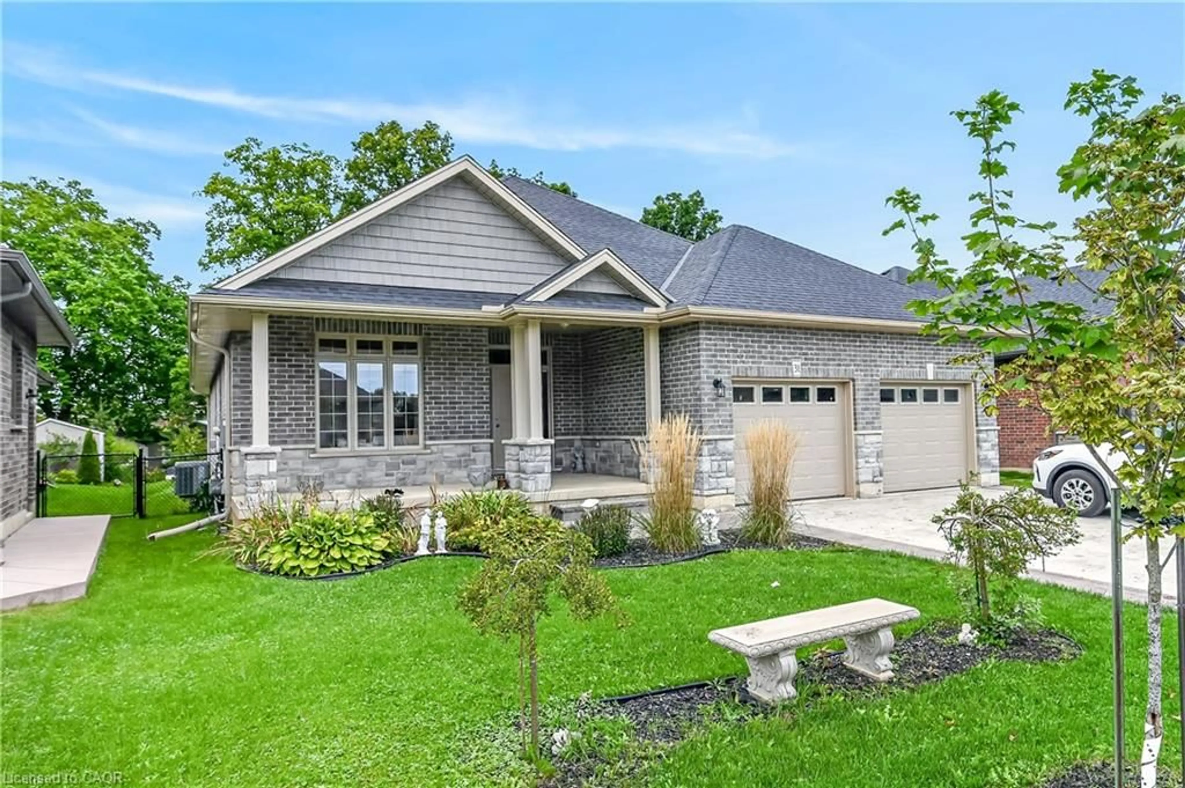 Home with brick exterior material, street for 31 Sycamore Dr, Port Dover Ontario N0A 1N6