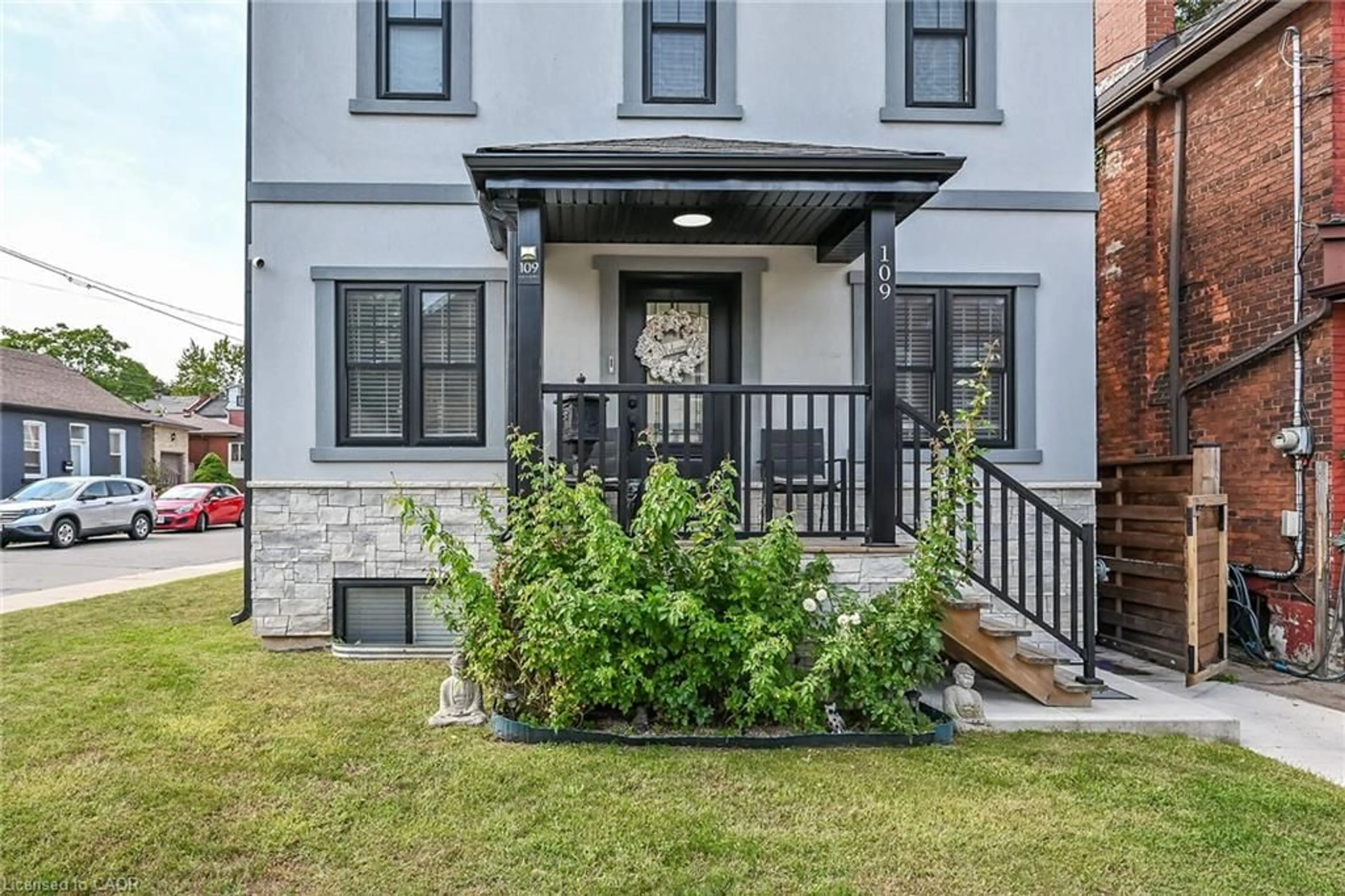 Home with brick exterior material, street for 109 Ray St, Hamilton Ontario L8R 2Y1